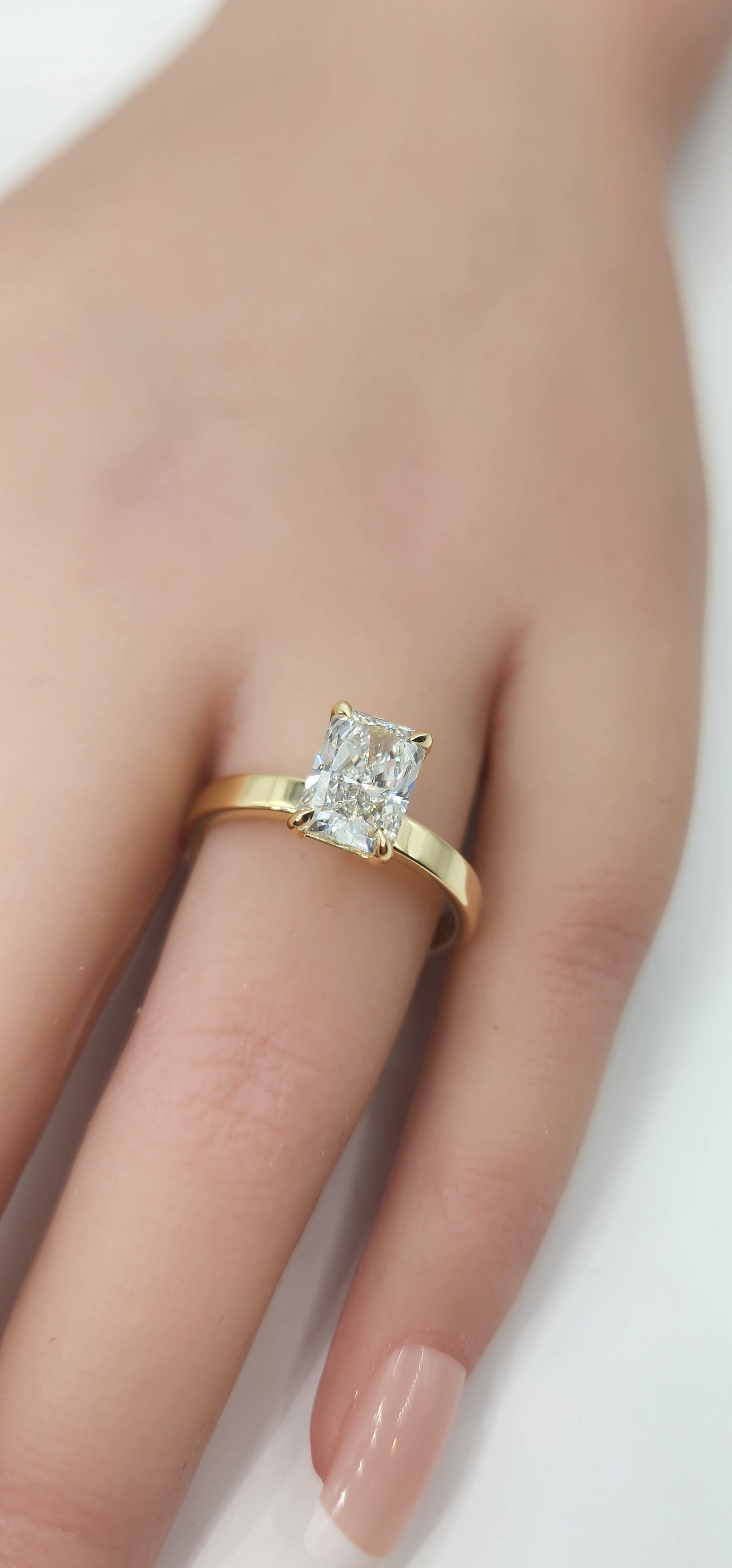 "The Cecilia", 2 Carat Radiant Lab Grown Diamond, H, VS1 on a 14k Yellow Gold 2.5mm Cigar Band