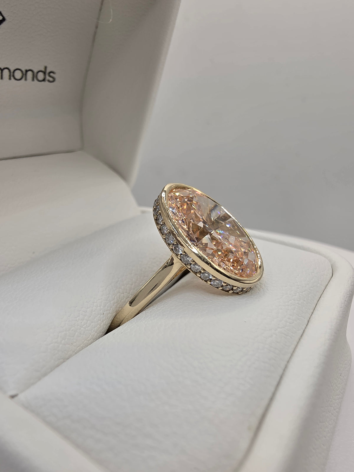 Pink diamond and yellow gold ring