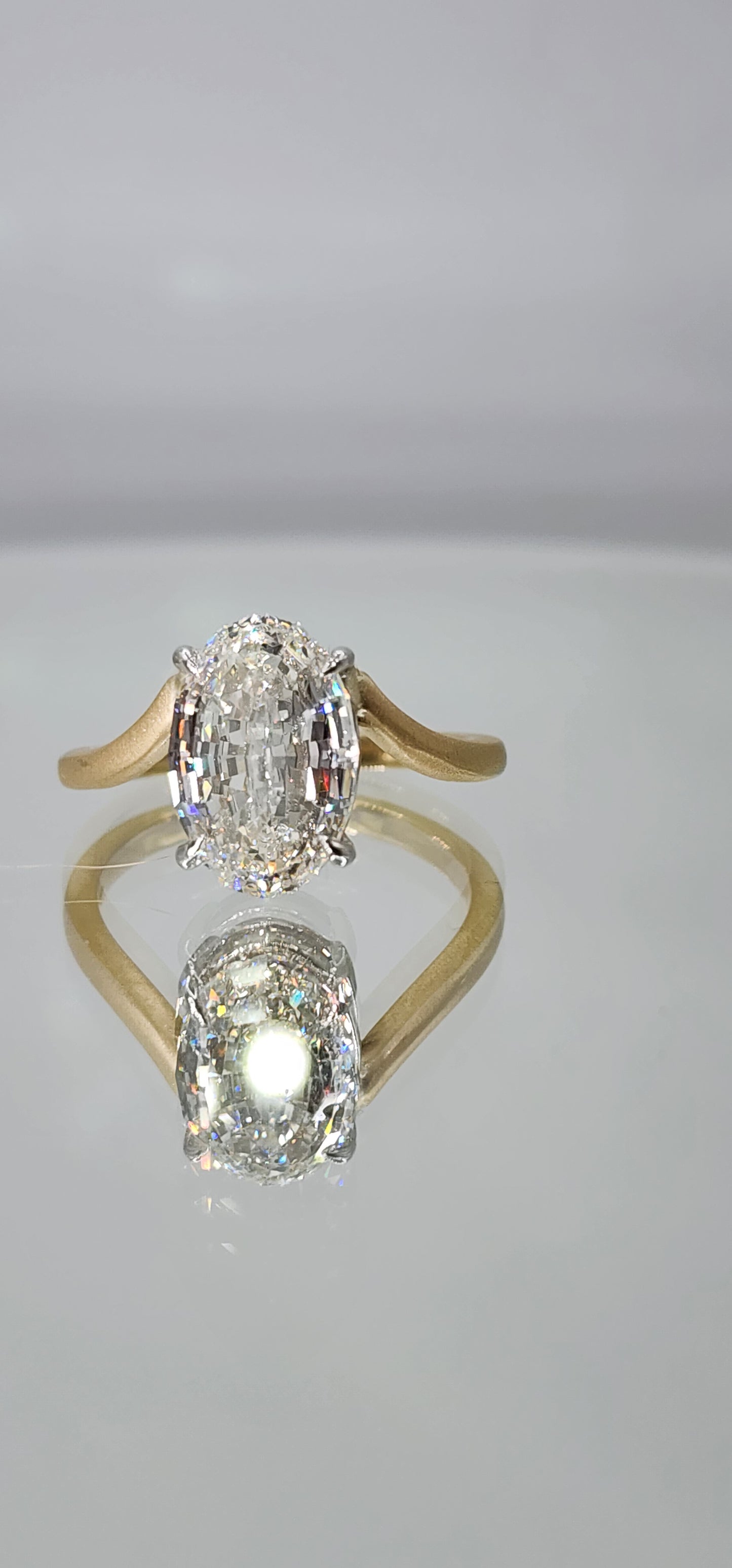 "The Kris" 4.14 Carat Step-Cut Oval Lab Grown Diamond on 14k Brushed Yellow Gold Contour Band