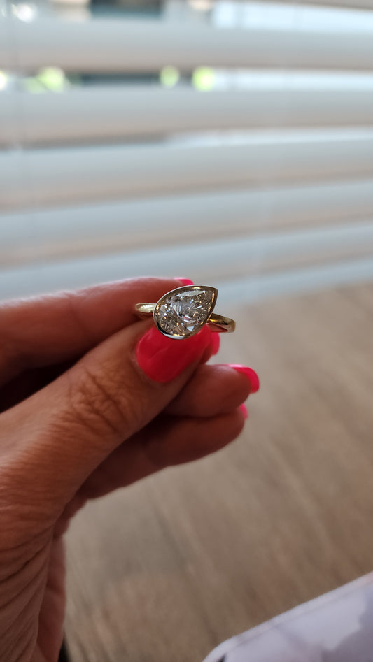 "The Kim Pear Bezel"  3 Carat Pear,  F, VS1 IGI Certified Lab Grown Diamond, set in a 14k White Gold Bezel Setting Head with a 14K Yellow Gold Band