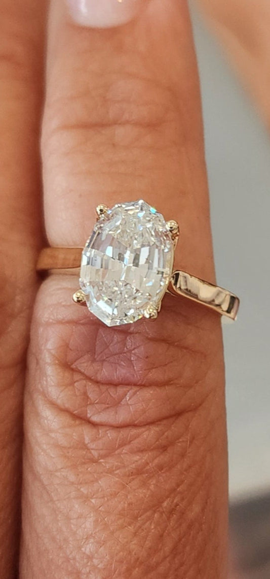 "The Tashina", 3.5 Carat Portuguese Oval, E, VS1 on a 2.5 mm Yellow Gold Cathedral-Style Band with Yellow Gold Petal Prongs