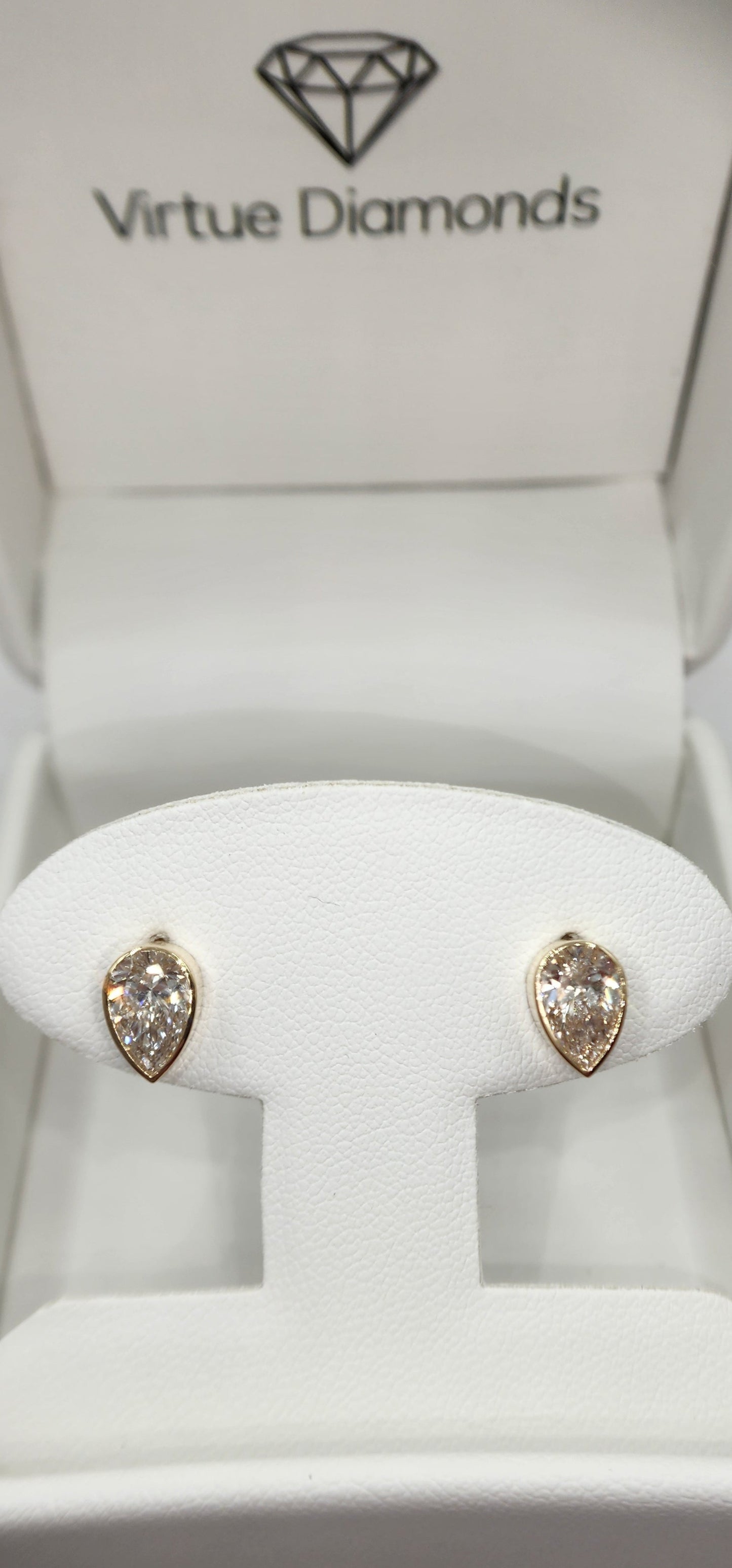2 Carat Total Weight Pear Stud Earrings Bezel Set in 14k Yellow Gold, 2 Carat Total Weight.