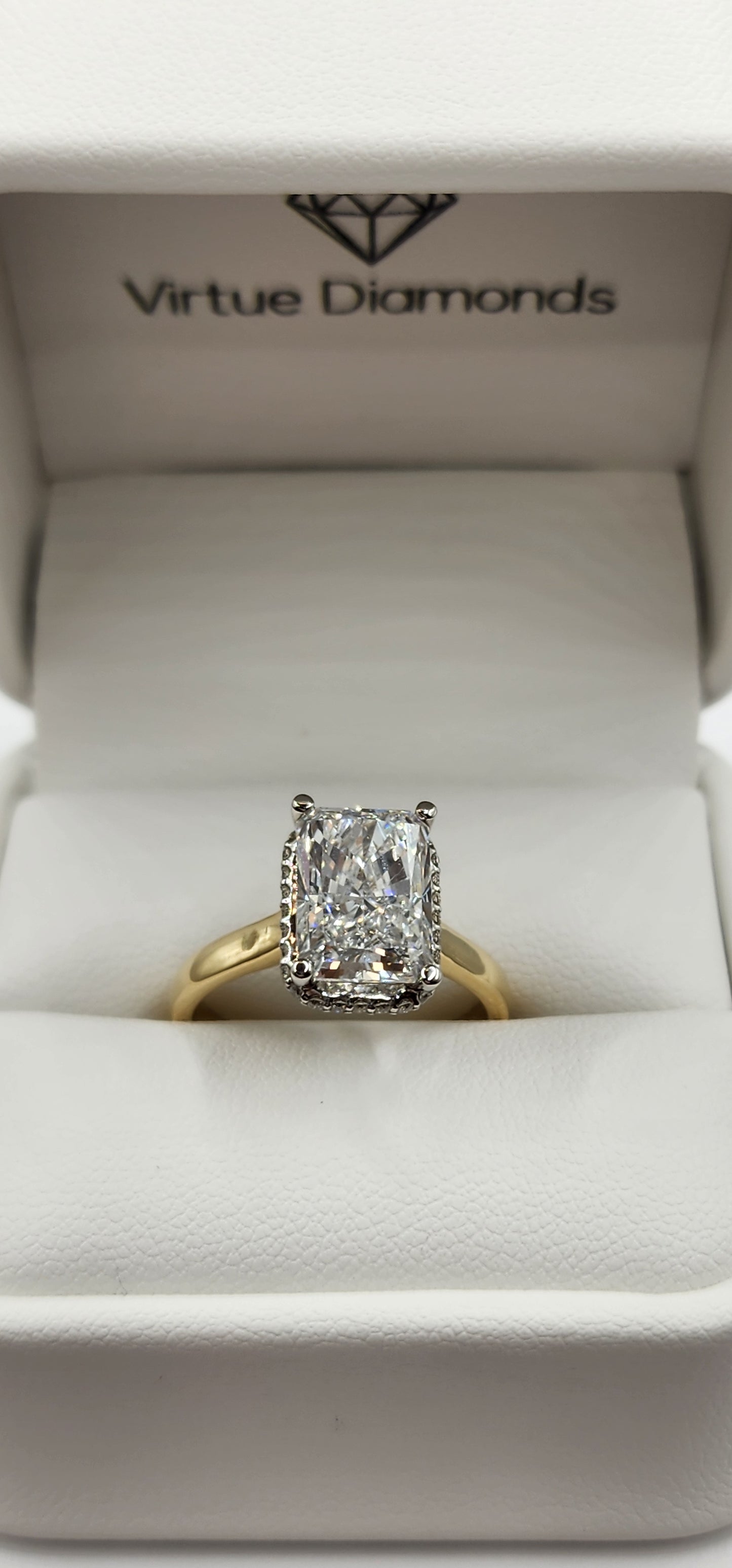 "The Monica" Ring - 3.75 Carat Radiant Lab Grown Diamond, Color E, VVS2, mounted in a 2mm Yellow Gold band with White Gold Head and Hidden Halo