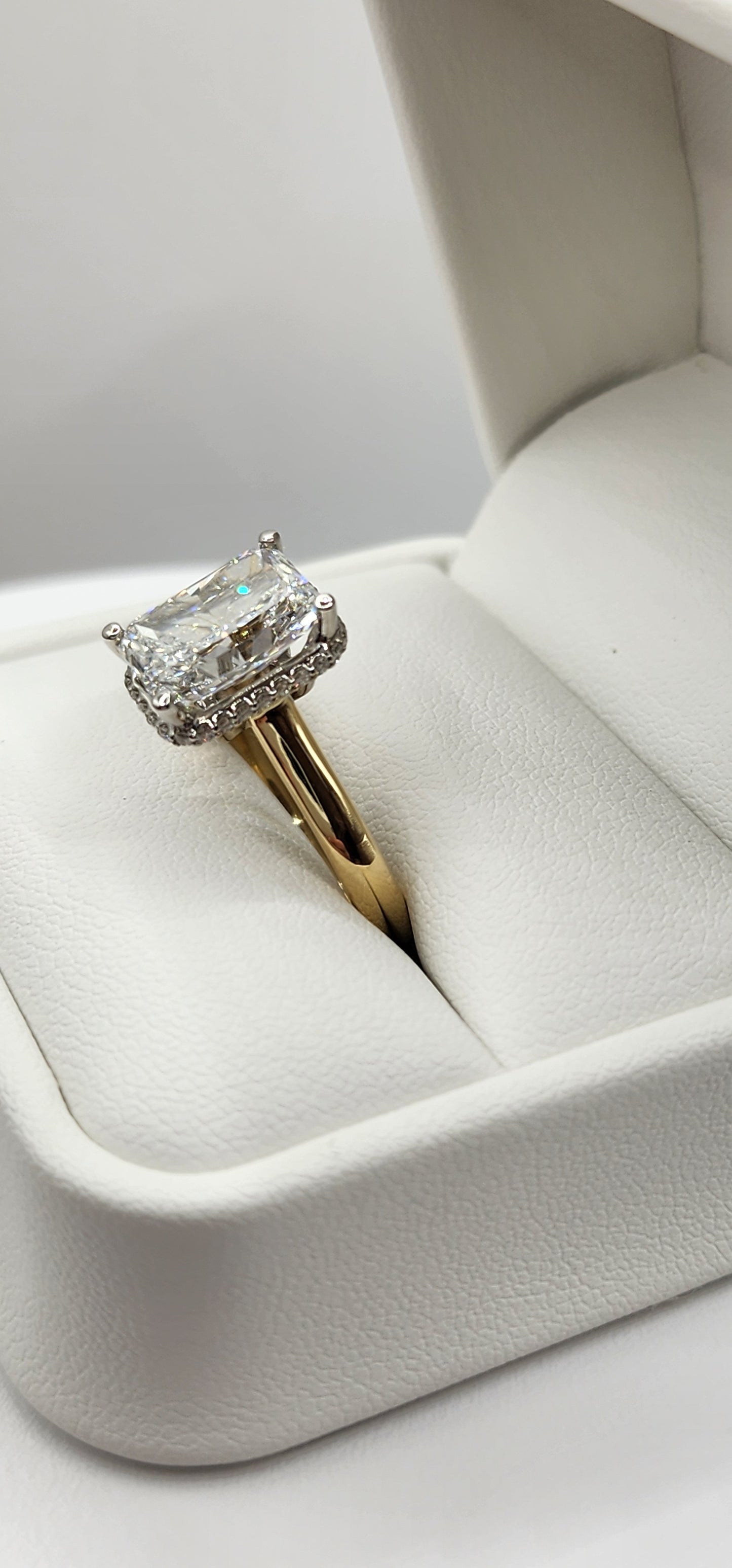 "The Monica" Ring - 3.75 Carat Radiant Lab Grown Diamond, Color E, VVS2, mounted in a 2mm Yellow Gold band with White Gold Head and Hidden Halo