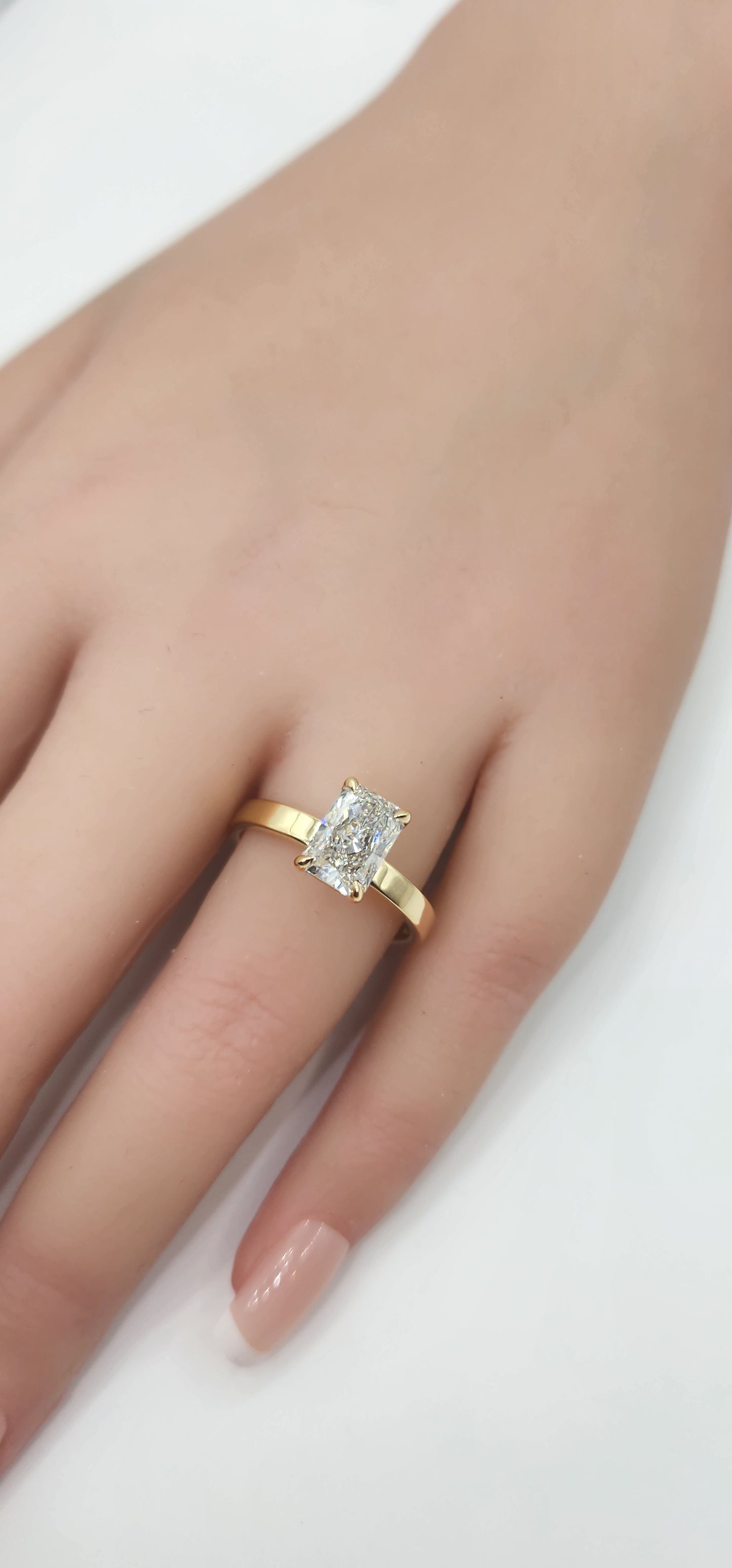 "The Cecilia", 2 Carat Radiant Lab Grown Diamond, H, VS1 on a 14k Yellow Gold 2.5mm Cigar Band