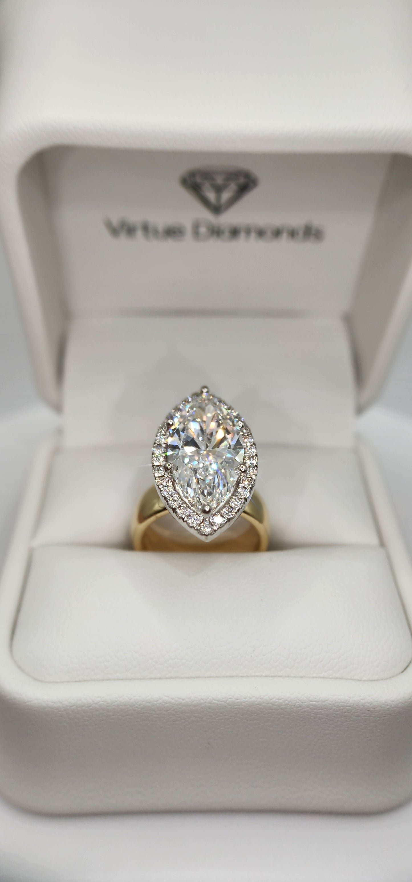 "The Hope" 5.5 Carat Marquise Lab Grown Diamond Set on a 5.5 mm 14k Yellow Gold Cigar Band, 14k White Gold Prongs and a Diamond Halo
