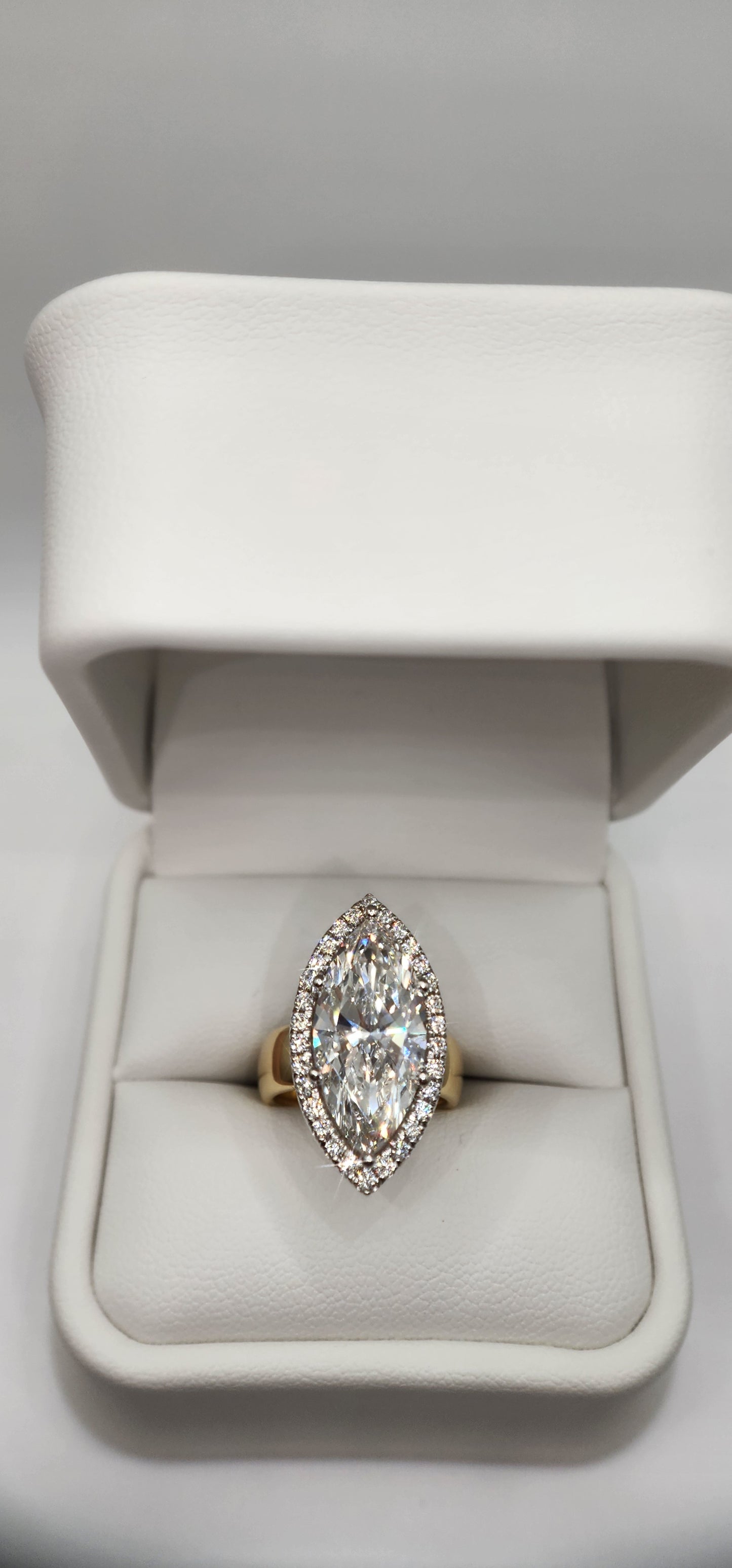 "The Hope" 5.5 Carat Marquise Lab Grown Diamond Set on a 5.5 mm 14k Yellow Gold Cigar Band, 14k White Gold Prongs and a Diamond Halo