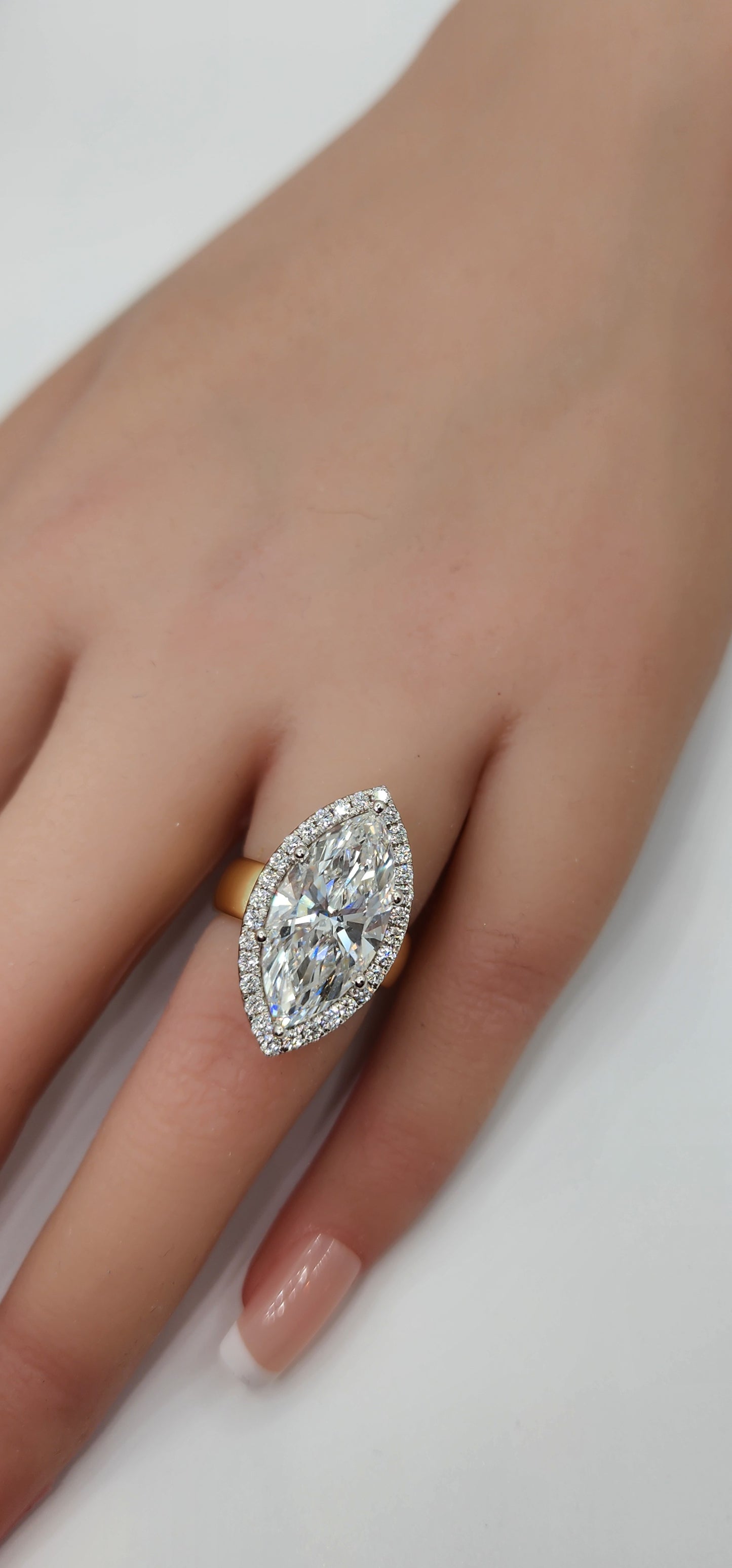 "The Hope" 5.5 Carat Marquise Lab Grown Diamond Set on a 5.5 mm 14k Yellow Gold Cigar Band, 14k White Gold Prongs and a Diamond Halo