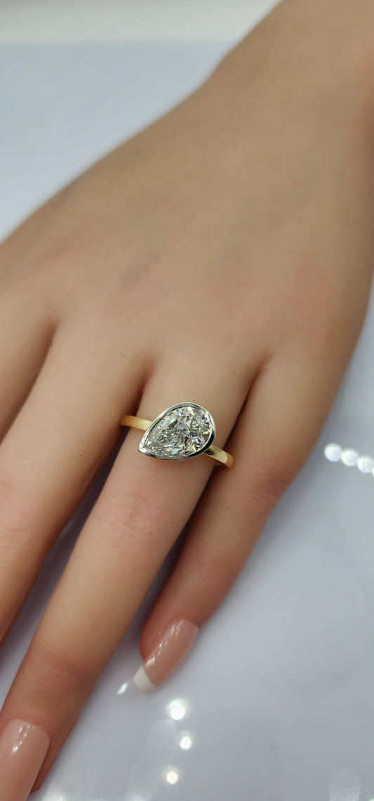 "The Kim Pear Bezel"  3 Carat Pear,  F, VS1 IGI Certified Lab Grown Diamond, set in a 14k White Gold Bezel Setting Head with a 14K Yellow Gold Band