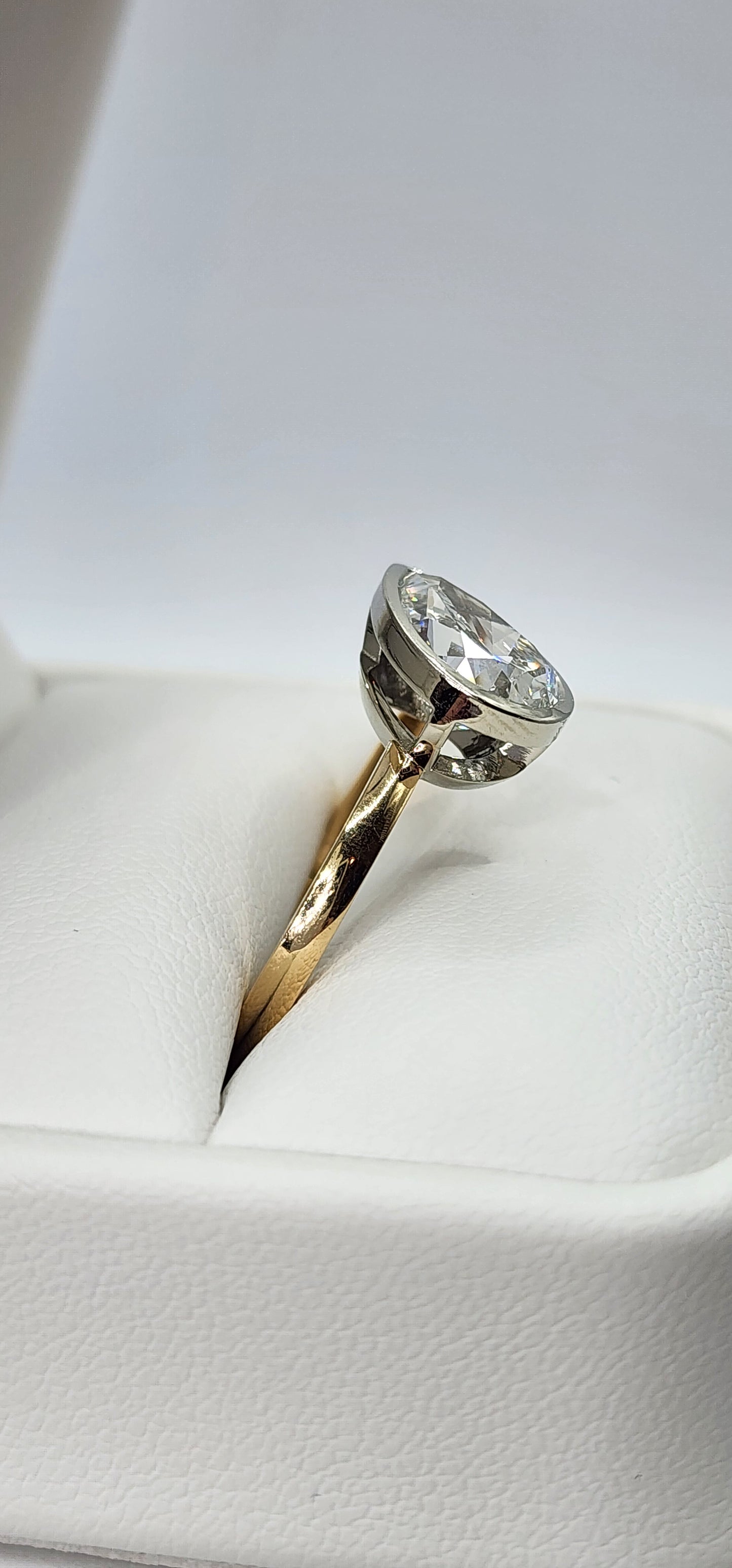 "The Kim Pear Bezel"  3 Carat Pear,  F, VS1 IGI Certified Lab Grown Diamond, set in a 14k White Gold Bezel Setting Head with a 14K Yellow Gold Band