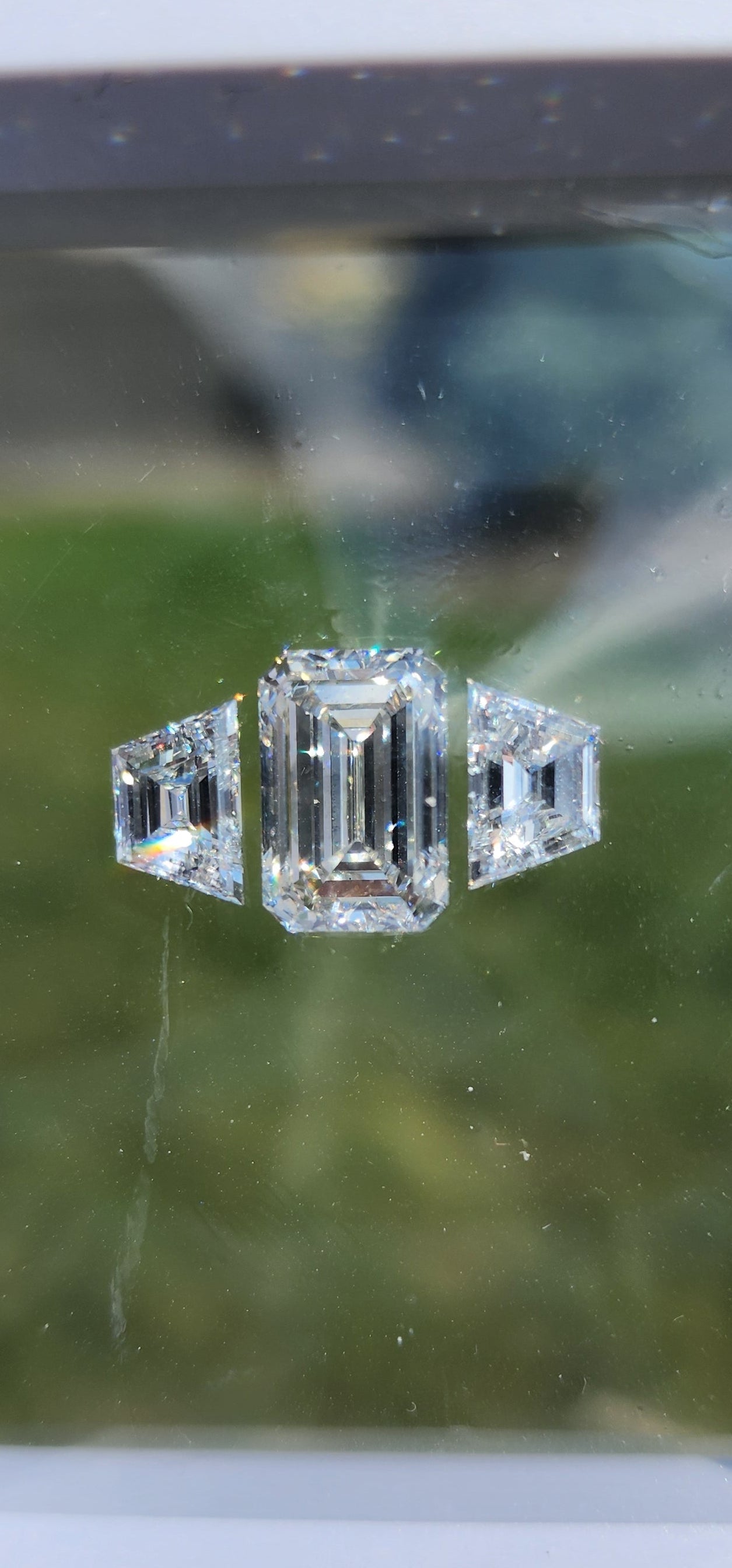 Trilogy Diamond Set (1) 4.04 H/SI1 Emerald Cut Lab Grown Diamond & (2) 1 .03 Carat Trapezoids F/VVS2 & E/VS1 for Trilogy Ring Setting