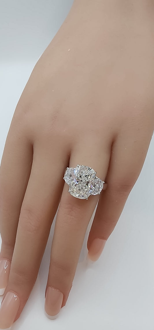 "The Diana" is a 5.51 Carat Elongated Cushion Lab Grown Diamond E/VS1 with 2 Half Moon Side Diamonds