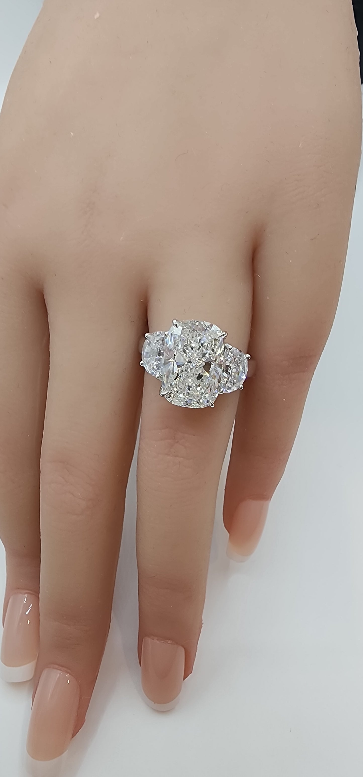 "The Diana" is a 5.51 Carat Elongated Cushion Lab Grown Diamond E/VS1 with 2 Half Moon Side Diamonds