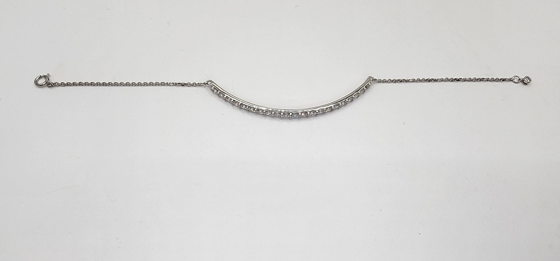 White gold and diamond bracelet on a white background