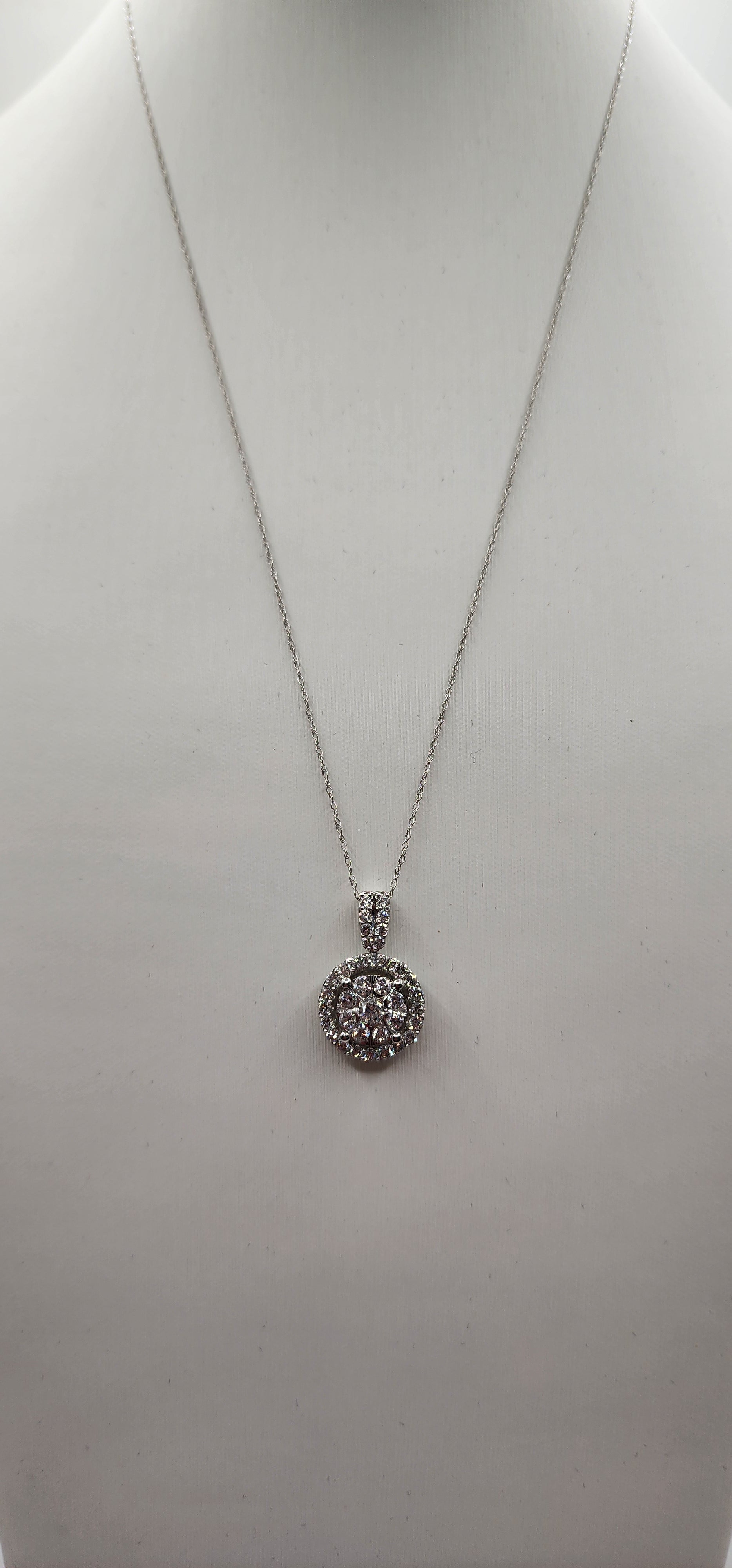 White Gold pendant on a necklace on a white background