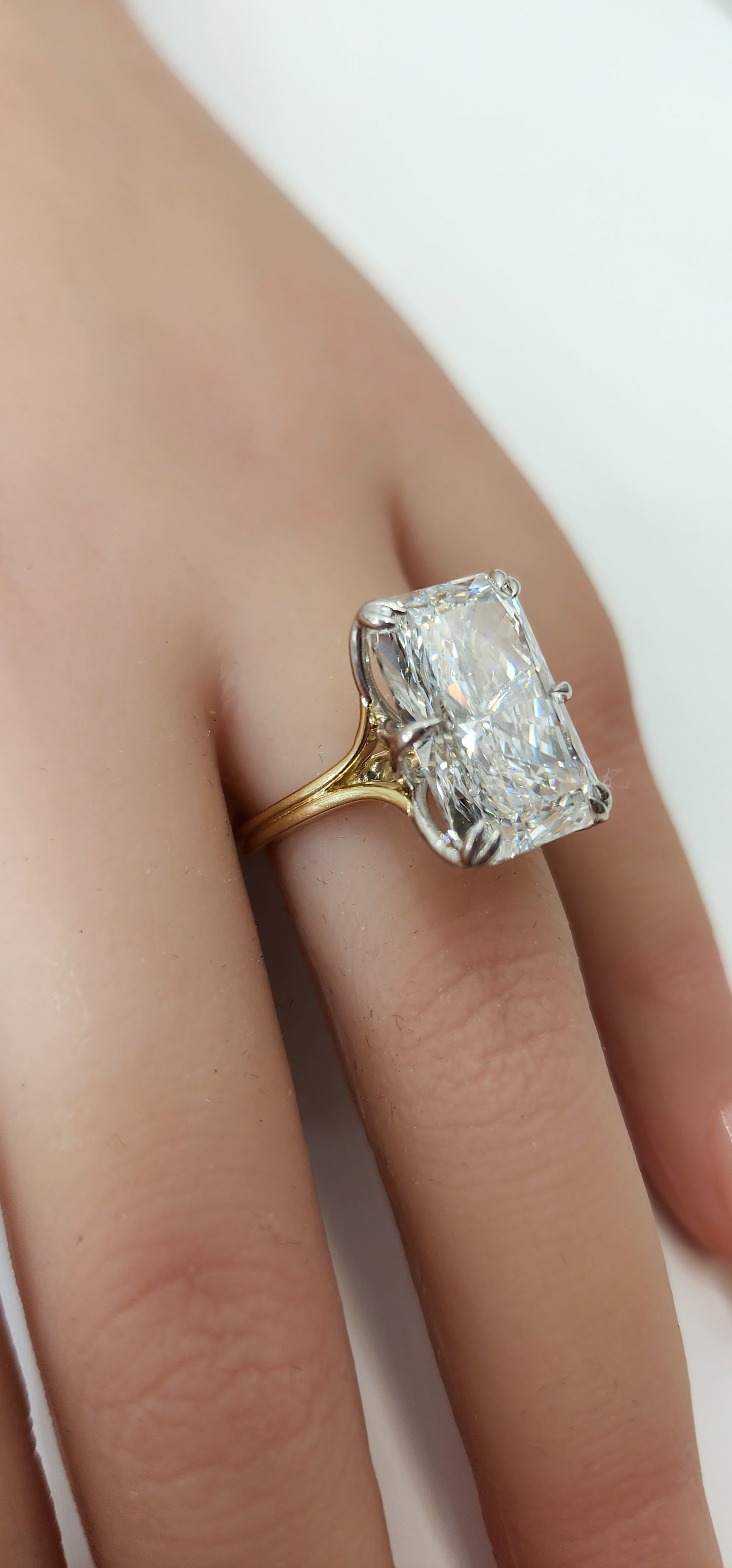 "The Lisa" is a 10 Carat Radiant Lab Grown Diamond on a 14k 2-tone Split Shank Solitaire