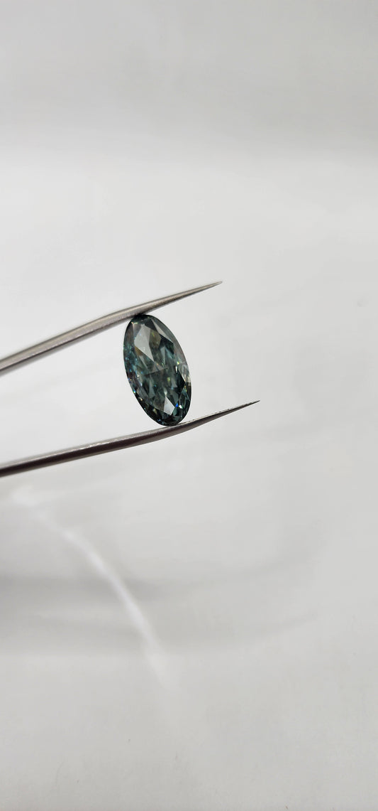 Diamond on a thin metal rod against a light gray background