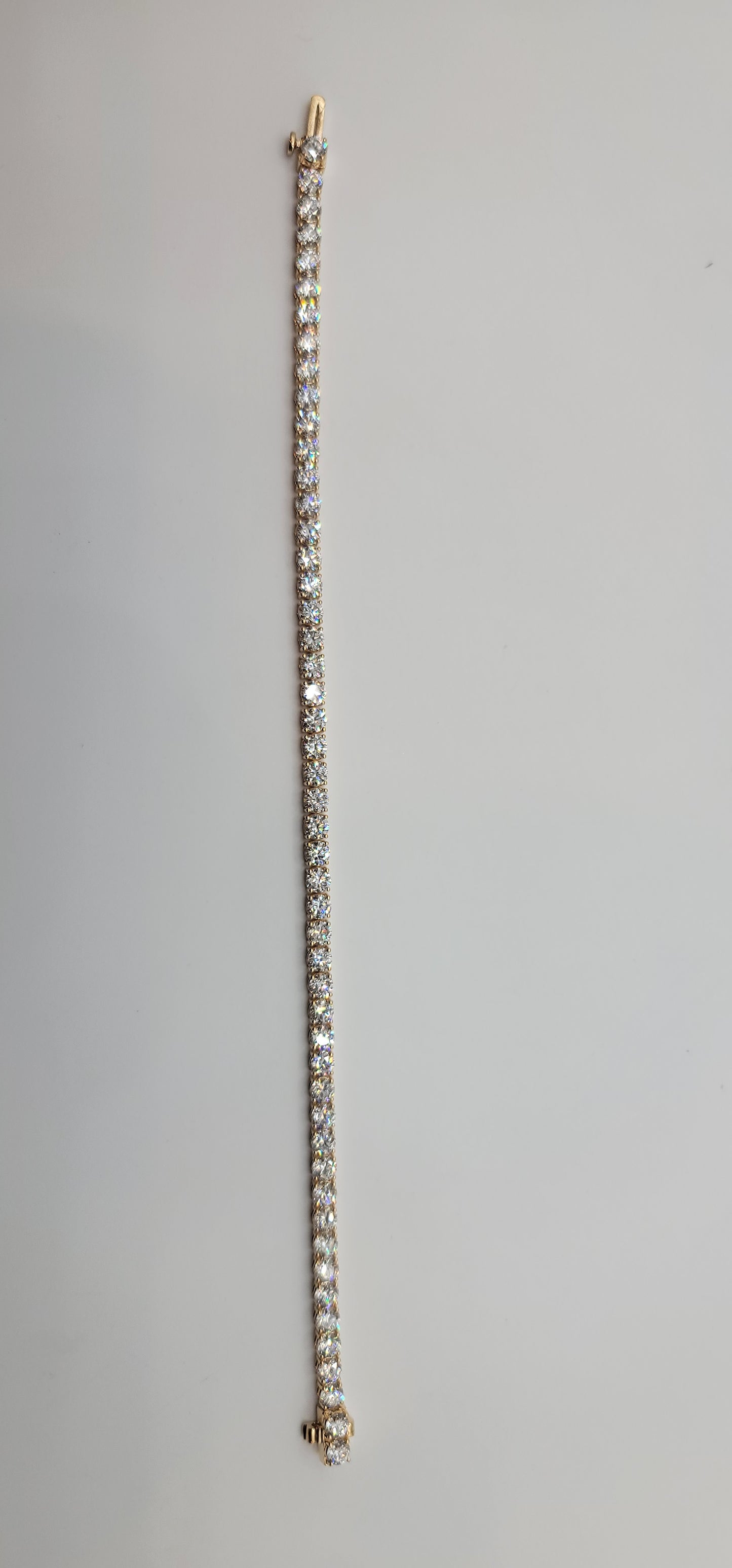Diamond bracelet on a light gray background