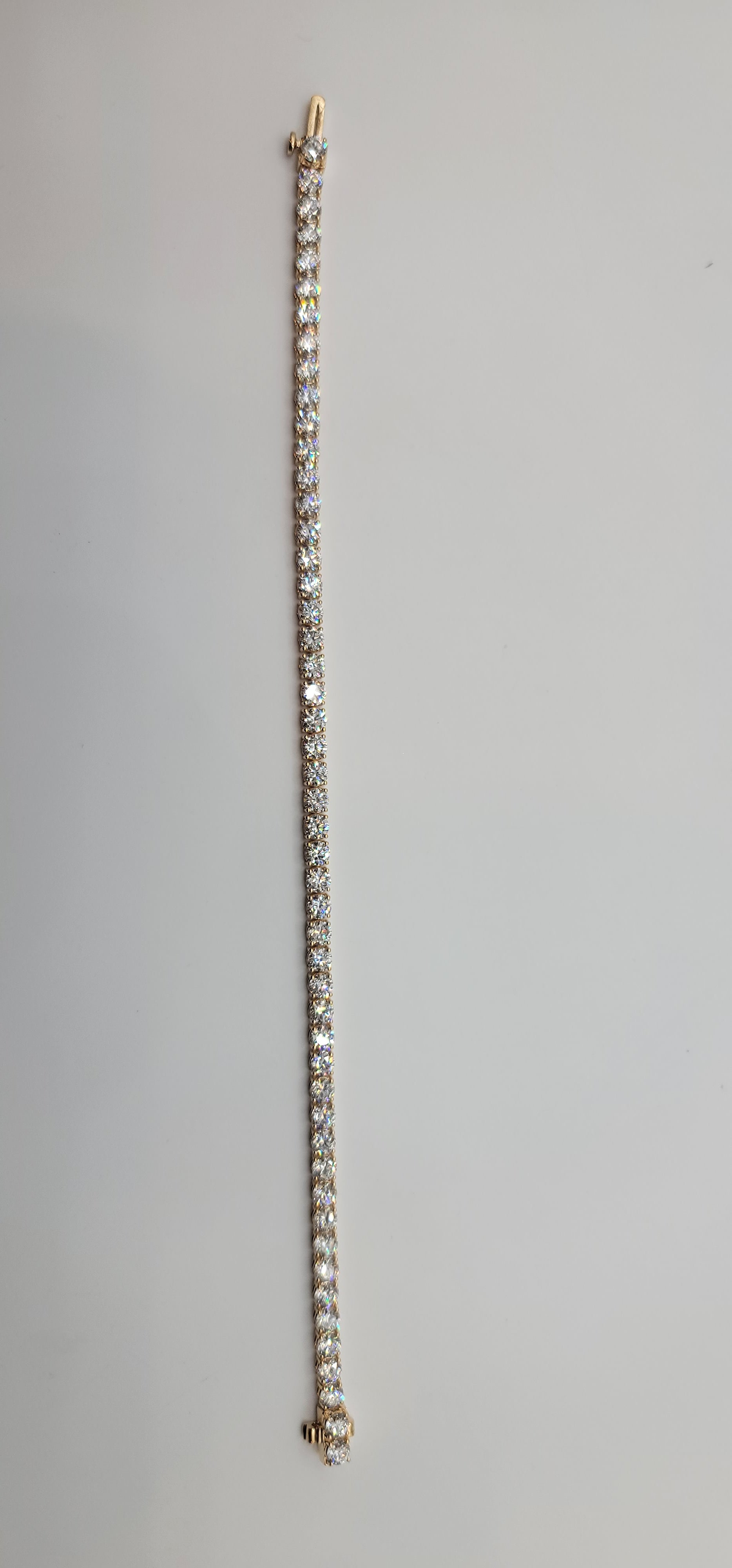 Diamond bracelet on a light gray background