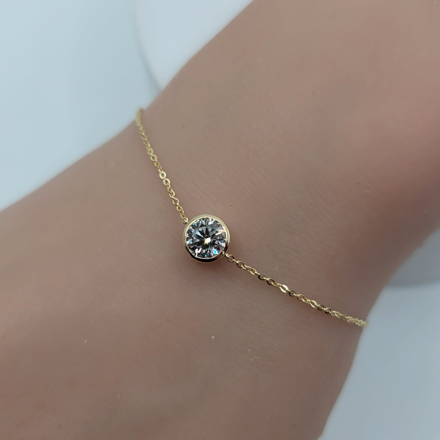 Lab grown diamond solitaire bracelet on white background