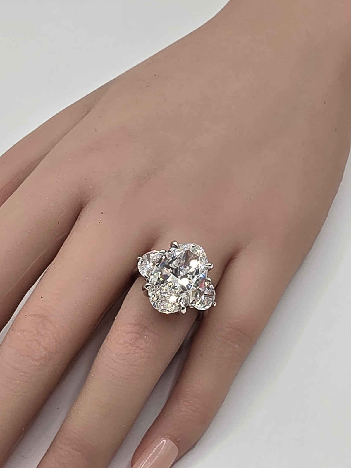 The Sopia a 10 Carat Oval Lab Diamond F/VVS2, IGI Certified w/1.6 cttw half moons in Platinum
