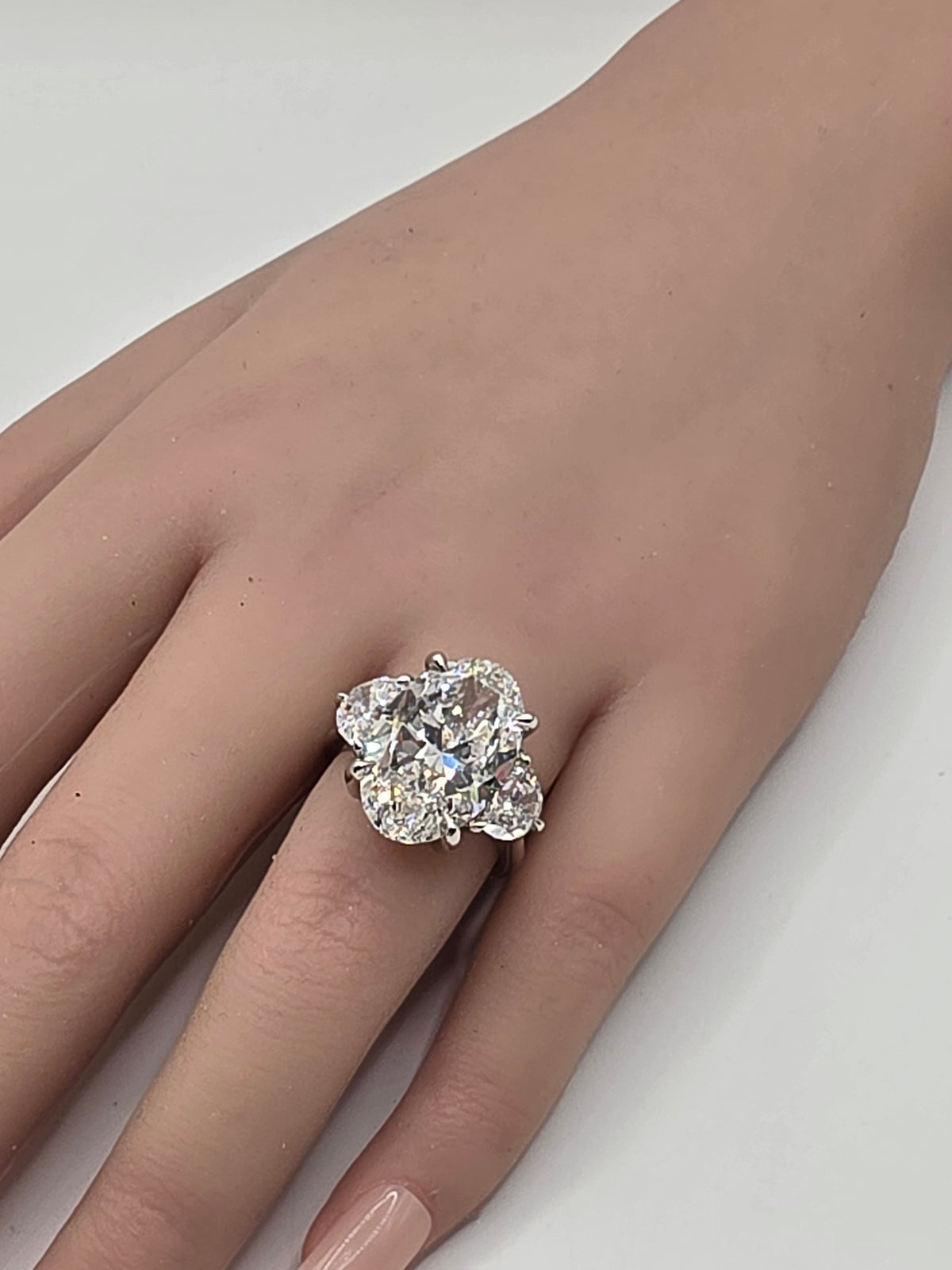 The Sopia a 10 Carat Oval Lab Diamond F/VVS2, IGI Certified w/1.6 cttw half moons in Platinum