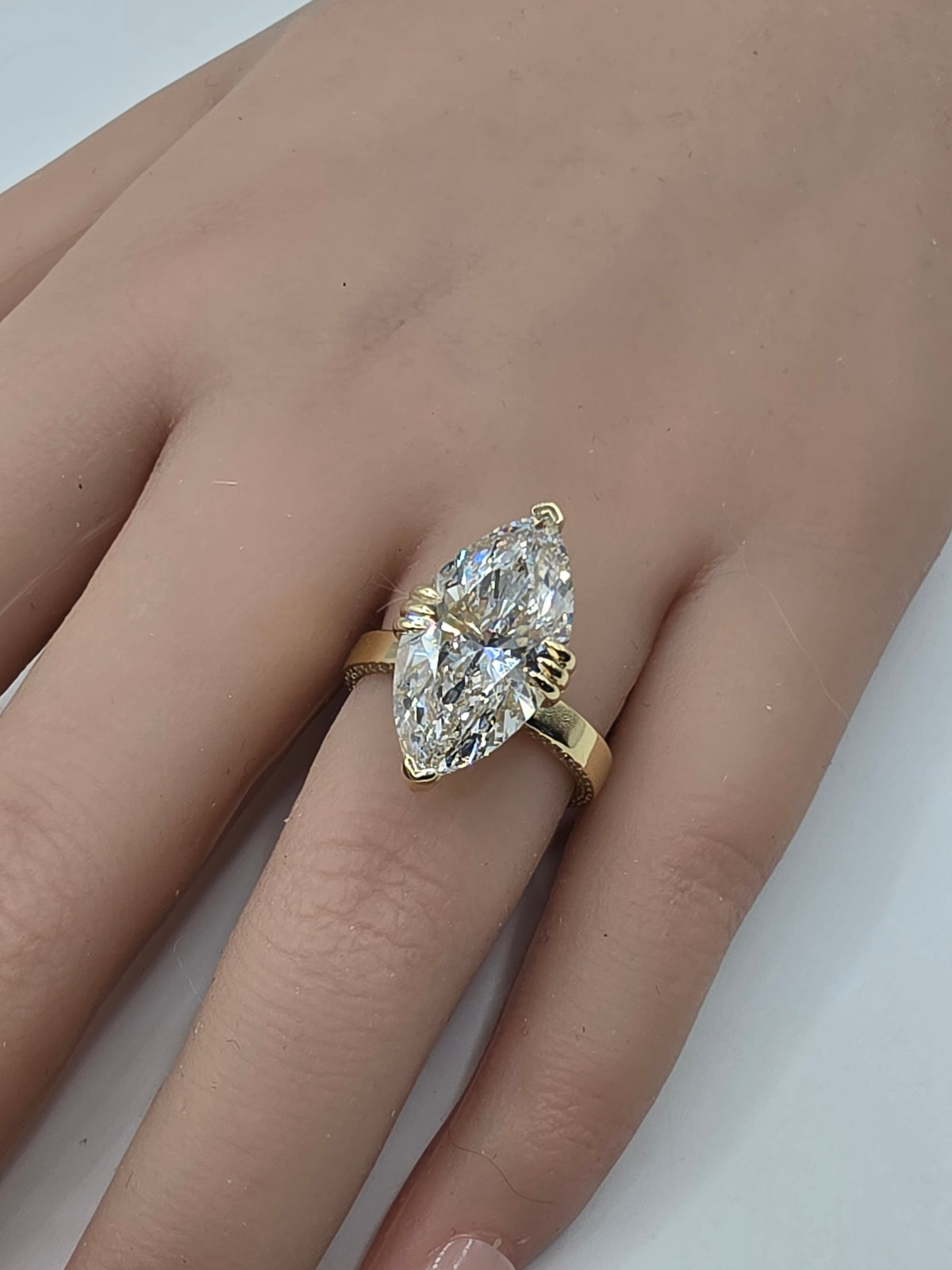 The Johnny a 7 carat Marquise Lab Diamond, F/VS1 with Baguette Halo, Profile Diamonds in 10k YG