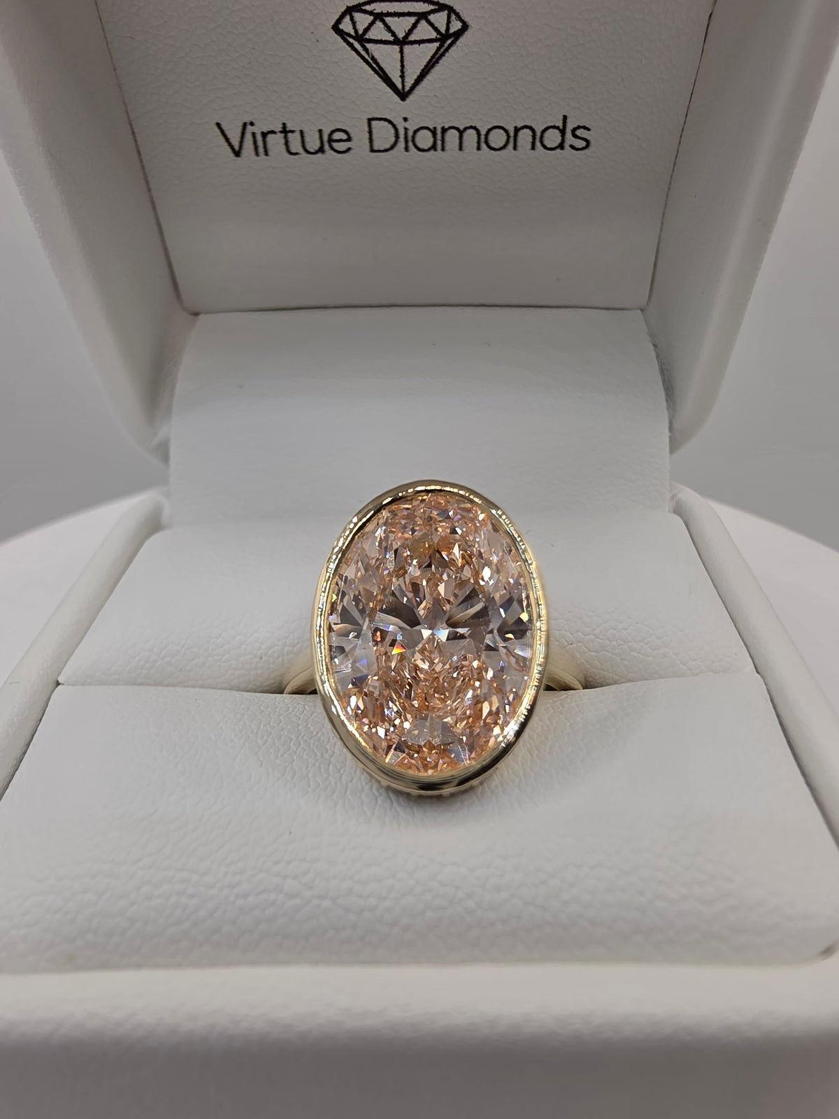 Pink diamond and yellow gold ring