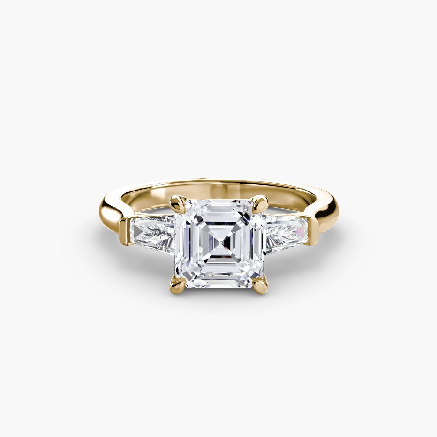 The "Oswego" Three-Stone Ring (Baguette Side Stones)