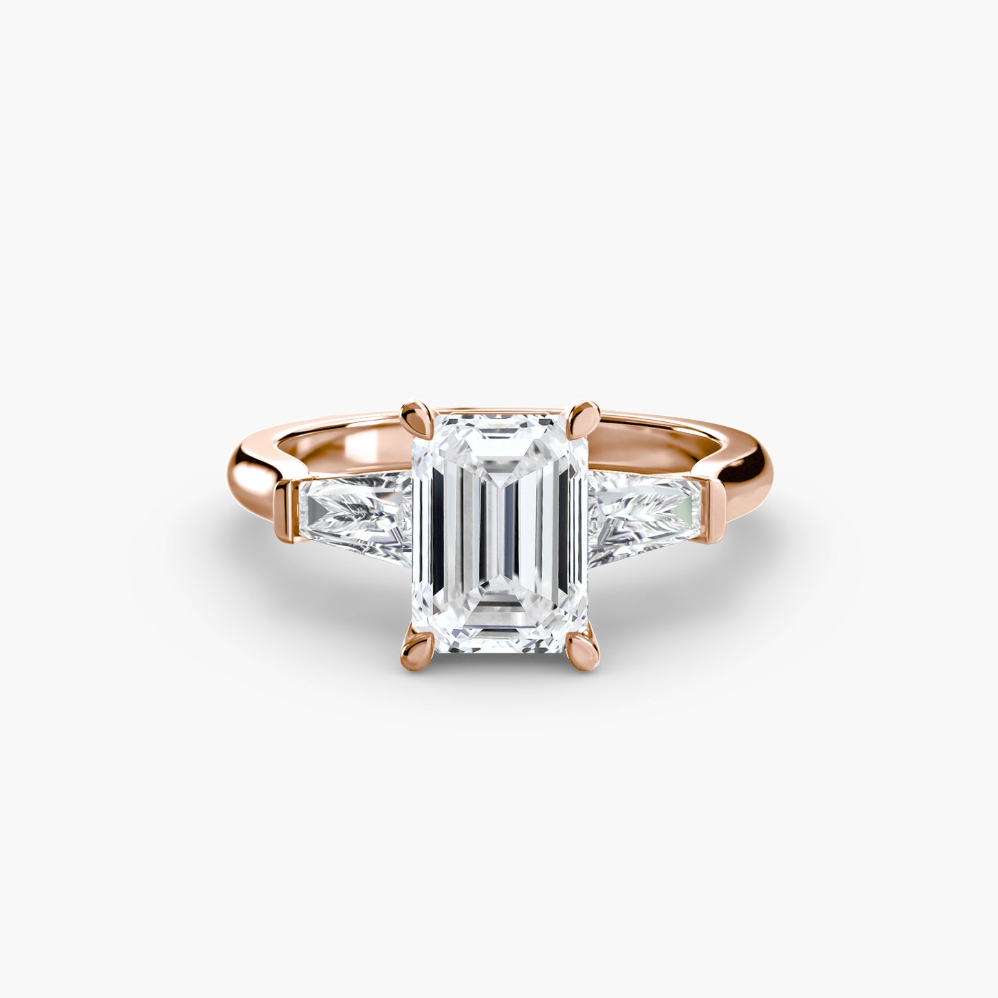 The "Oswego" Three-Stone Ring (Baguette Side Stones)