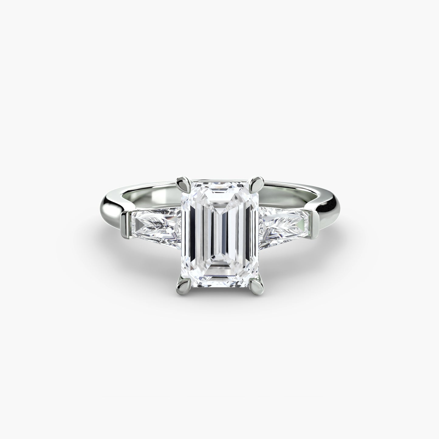The "Oswego" Three-Stone Ring (Baguette Side Stones)