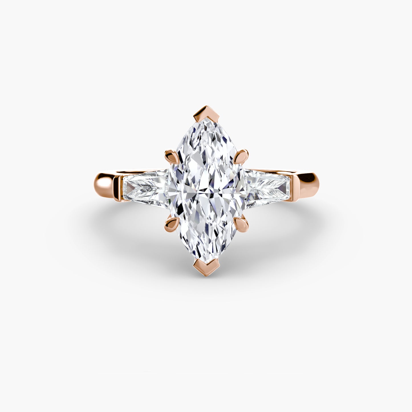 The "Oswego" Three-Stone Ring (Baguette Side Stones)
