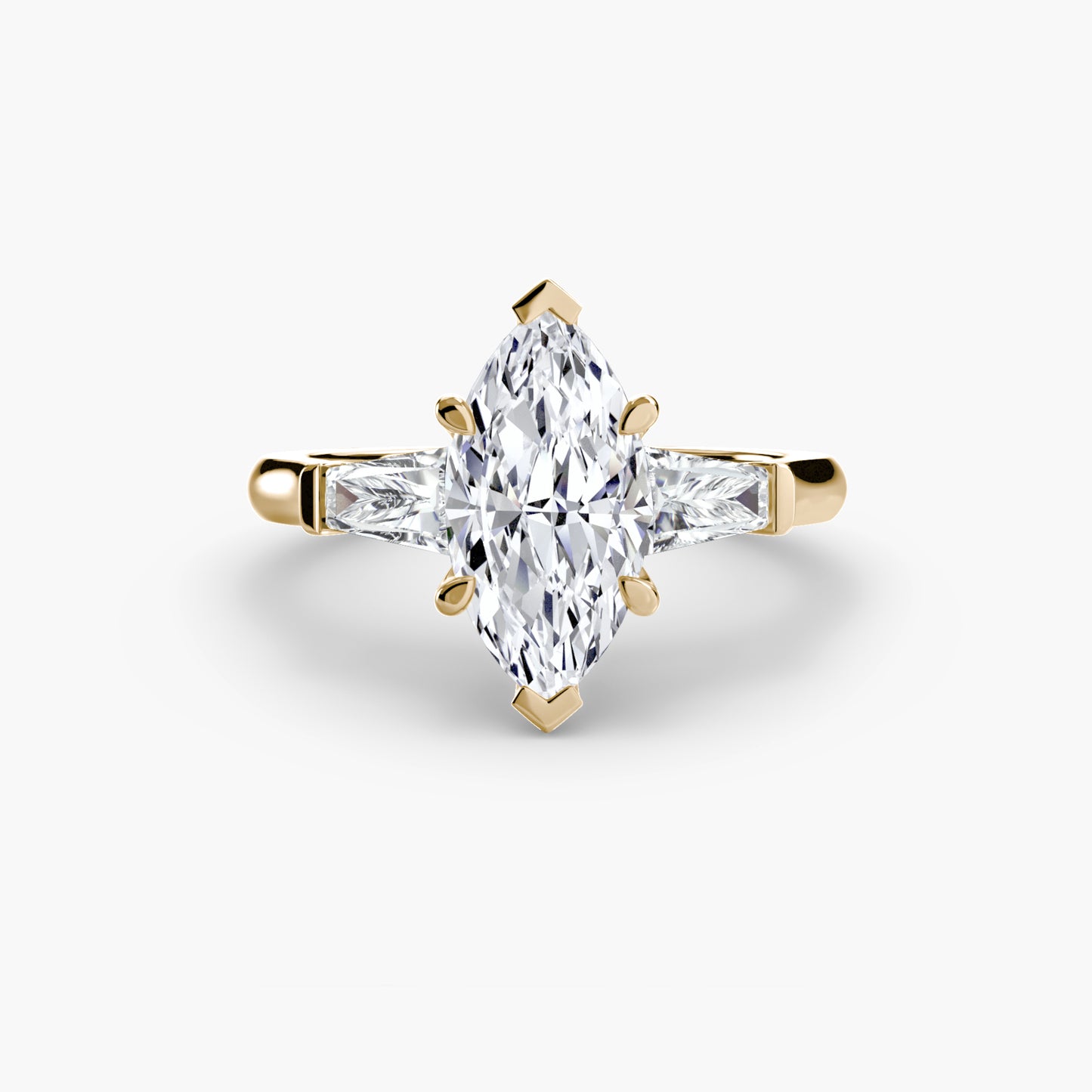 The "Oswego" Three-Stone Ring (Baguette Side Stones)