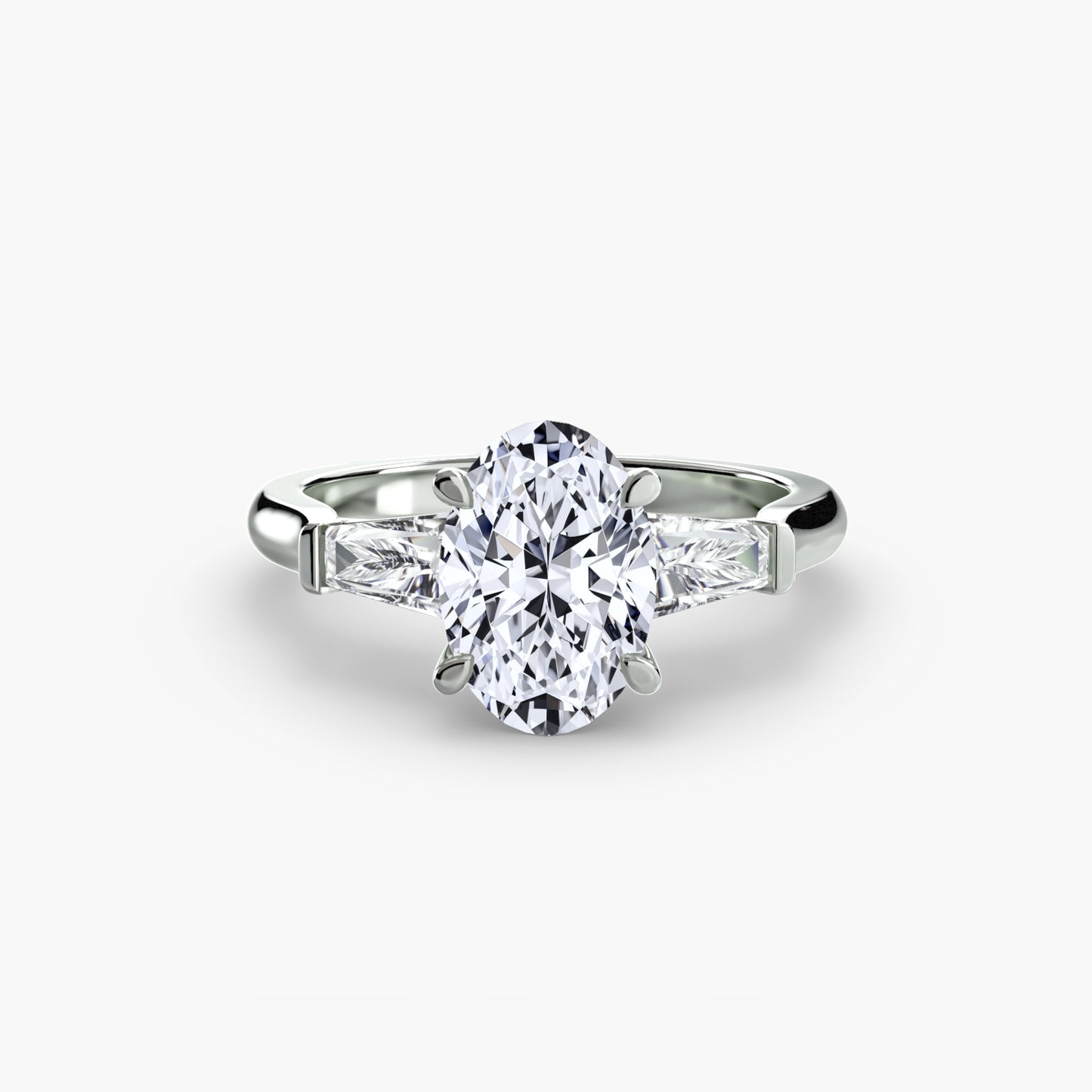 The "Oswego" Three-Stone Ring (Baguette Side Stones)