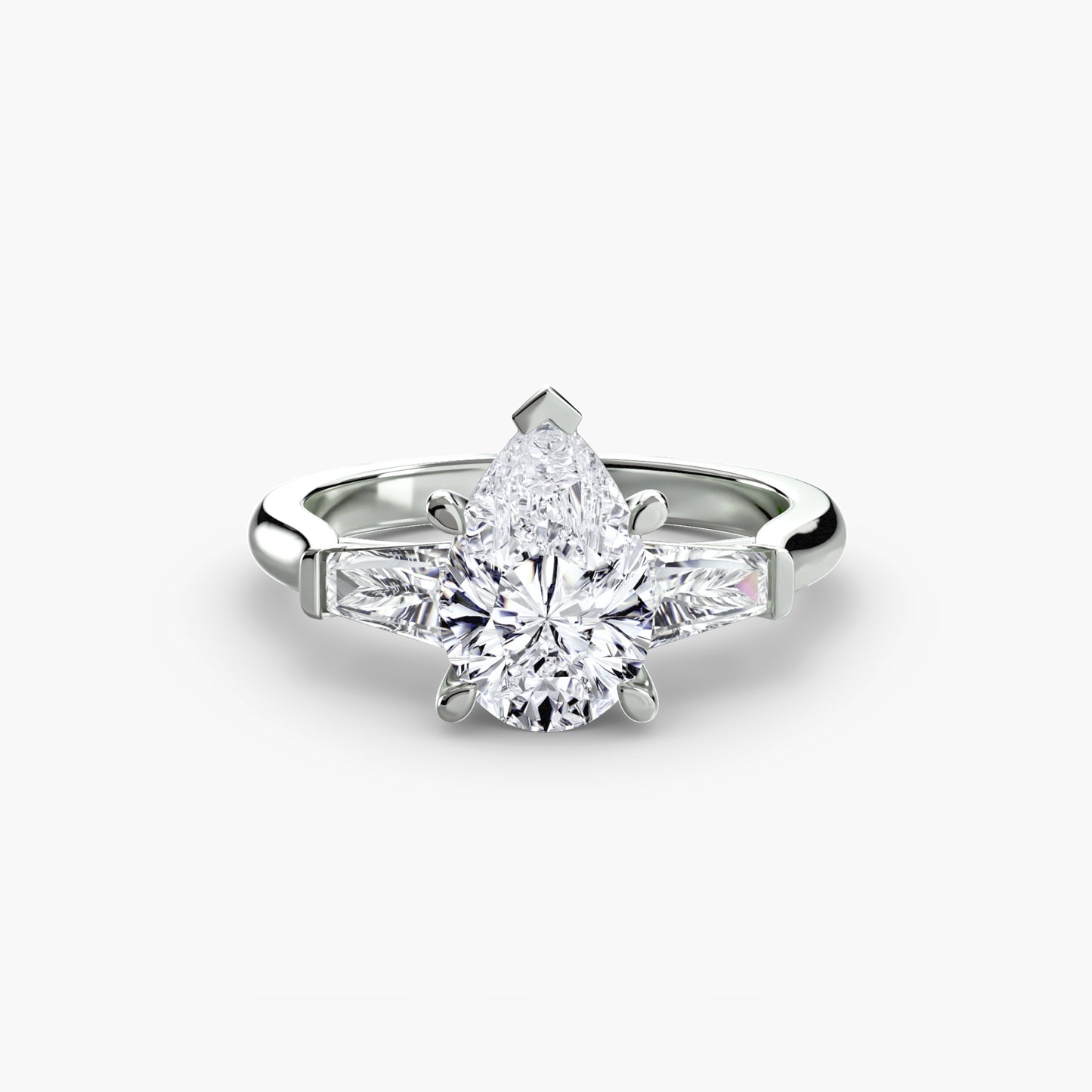 The "Oswego" Three-Stone Ring (Baguette Side Stones)