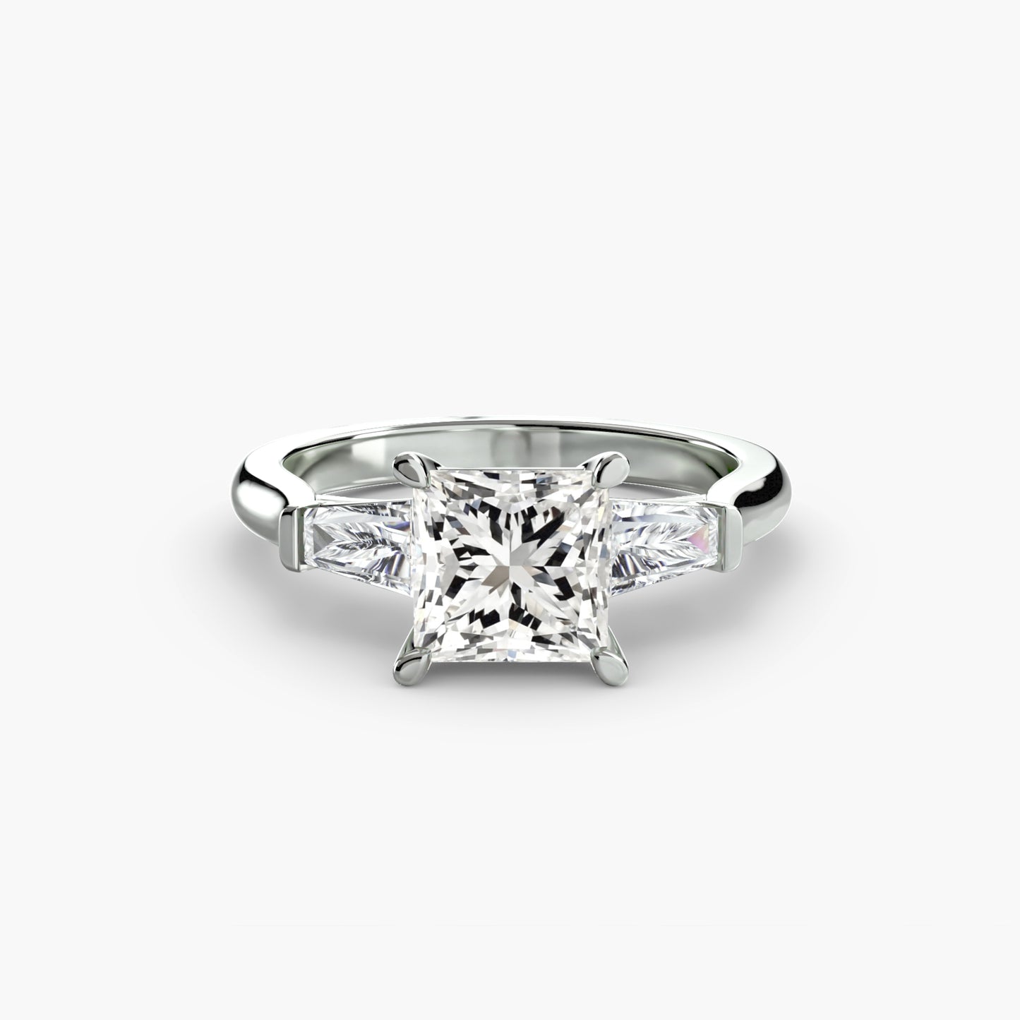 The "Oswego" Three-Stone Ring (Baguette Side Stones)