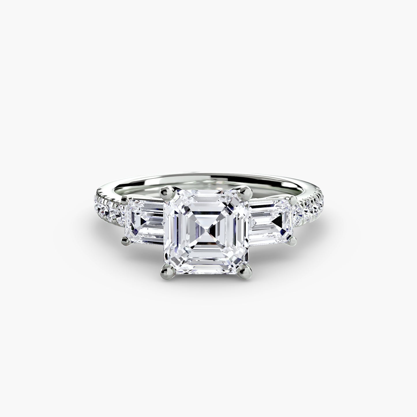 The "Portland" Three-Stone Ring with Pavé Band