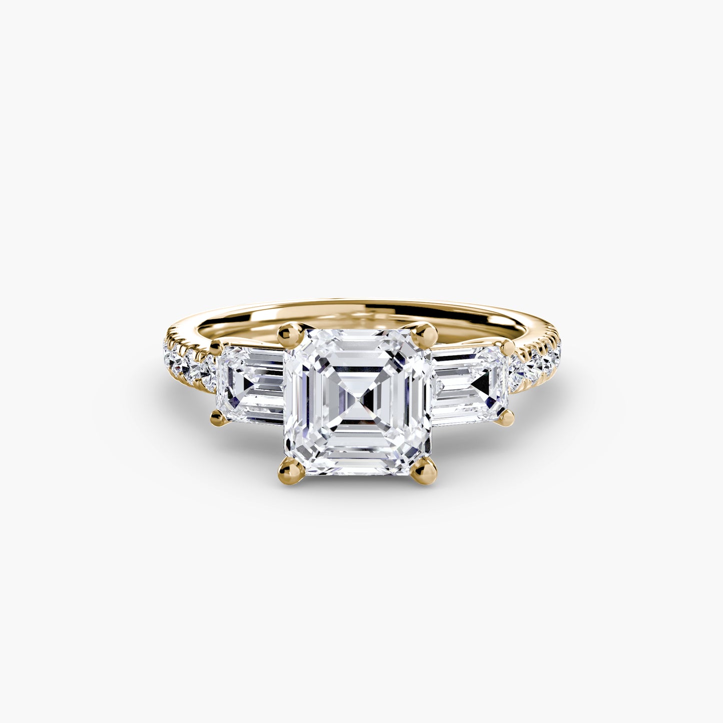 The "Portland" Three-Stone Ring with Pavé Band