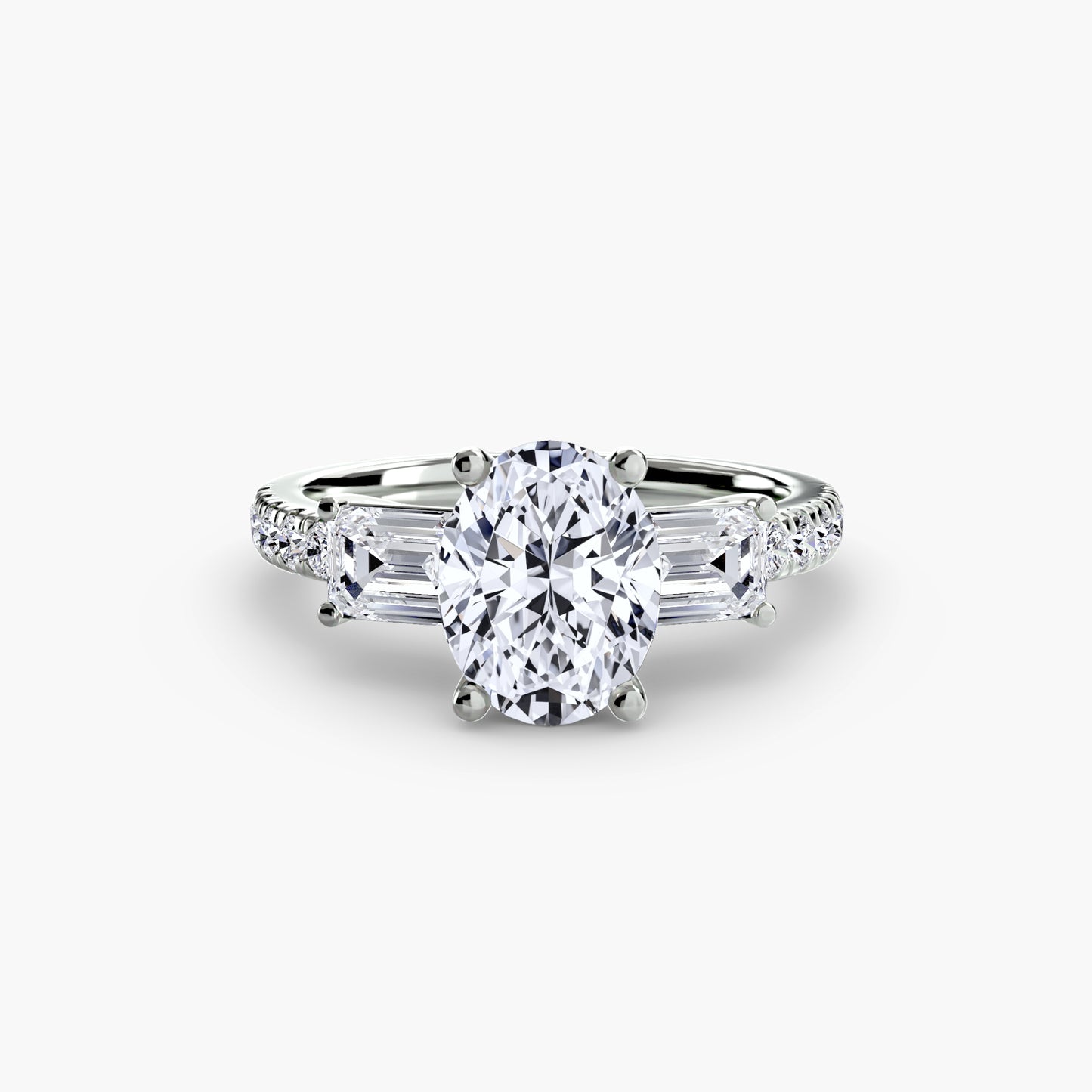 The "Portland" Three-Stone Ring with Pavé Band