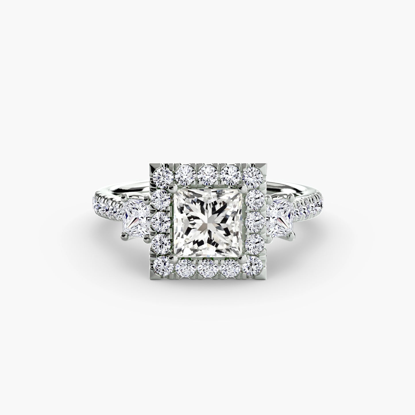 The "La Grande" Three-Stone Ring with Halo
