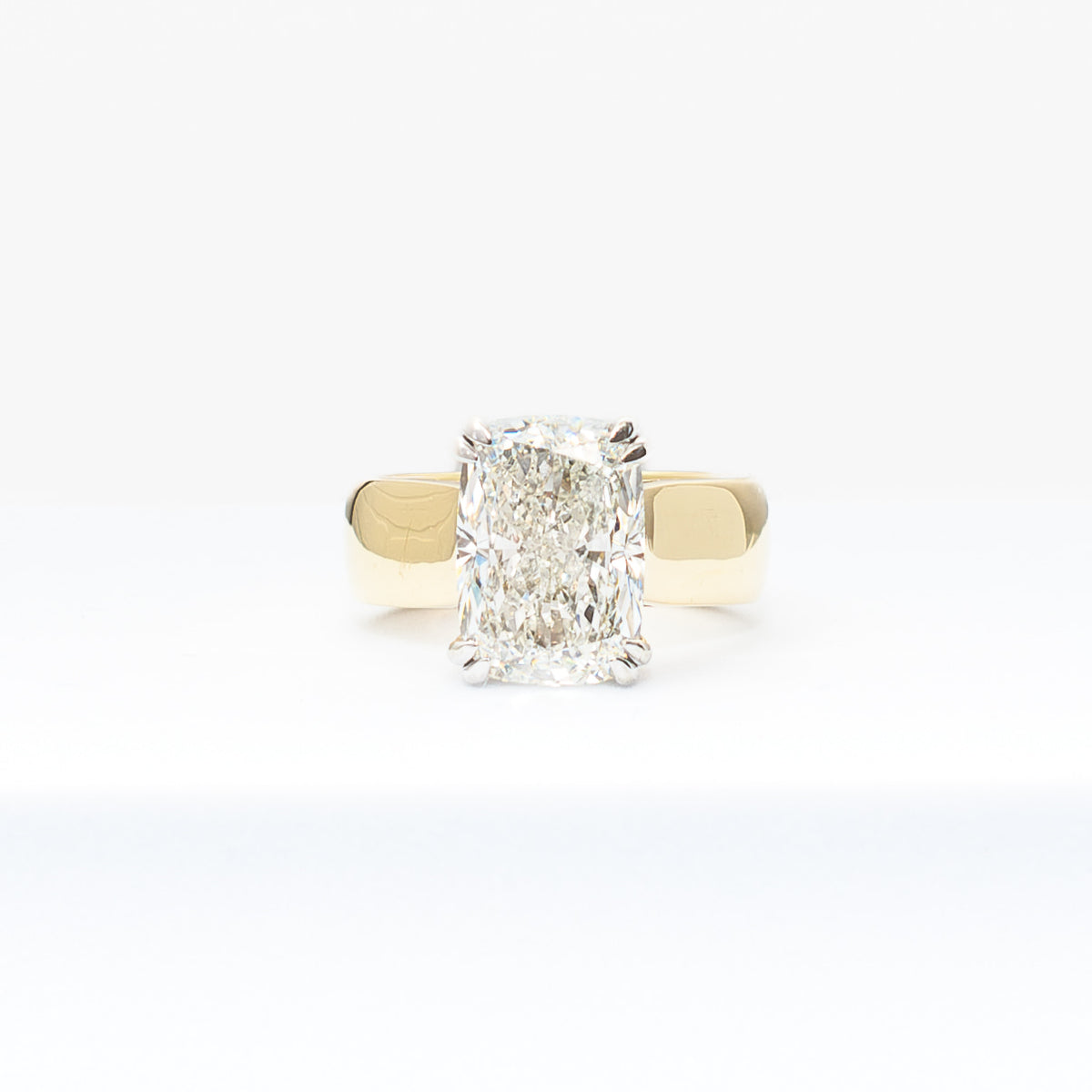 "The MaryLu" is the Kim With a Cathedral Setting - 4.5 Radiant Cut Lab Grown Diamond, on a Cathedral-Style 5.5 mm Cigar Band with Double Claw Prongs
