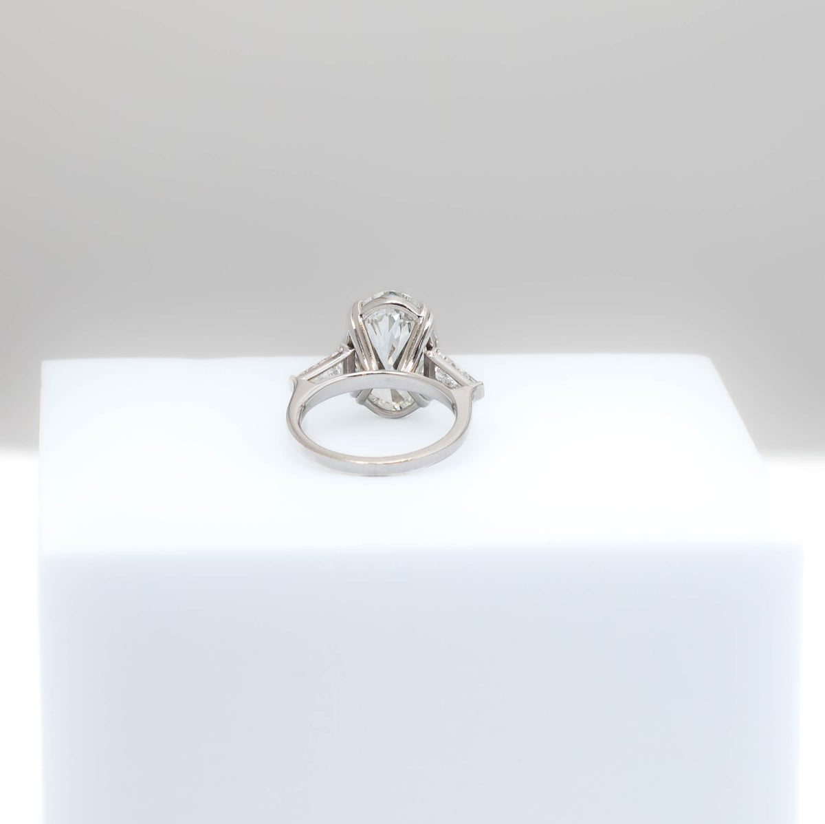 Gold and diamond ring on a white background