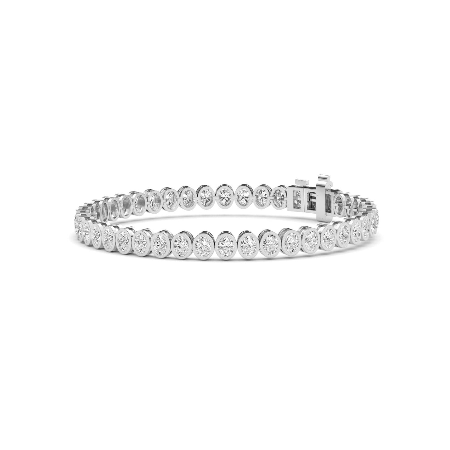 white gold and diamond bracelet in front of a white background