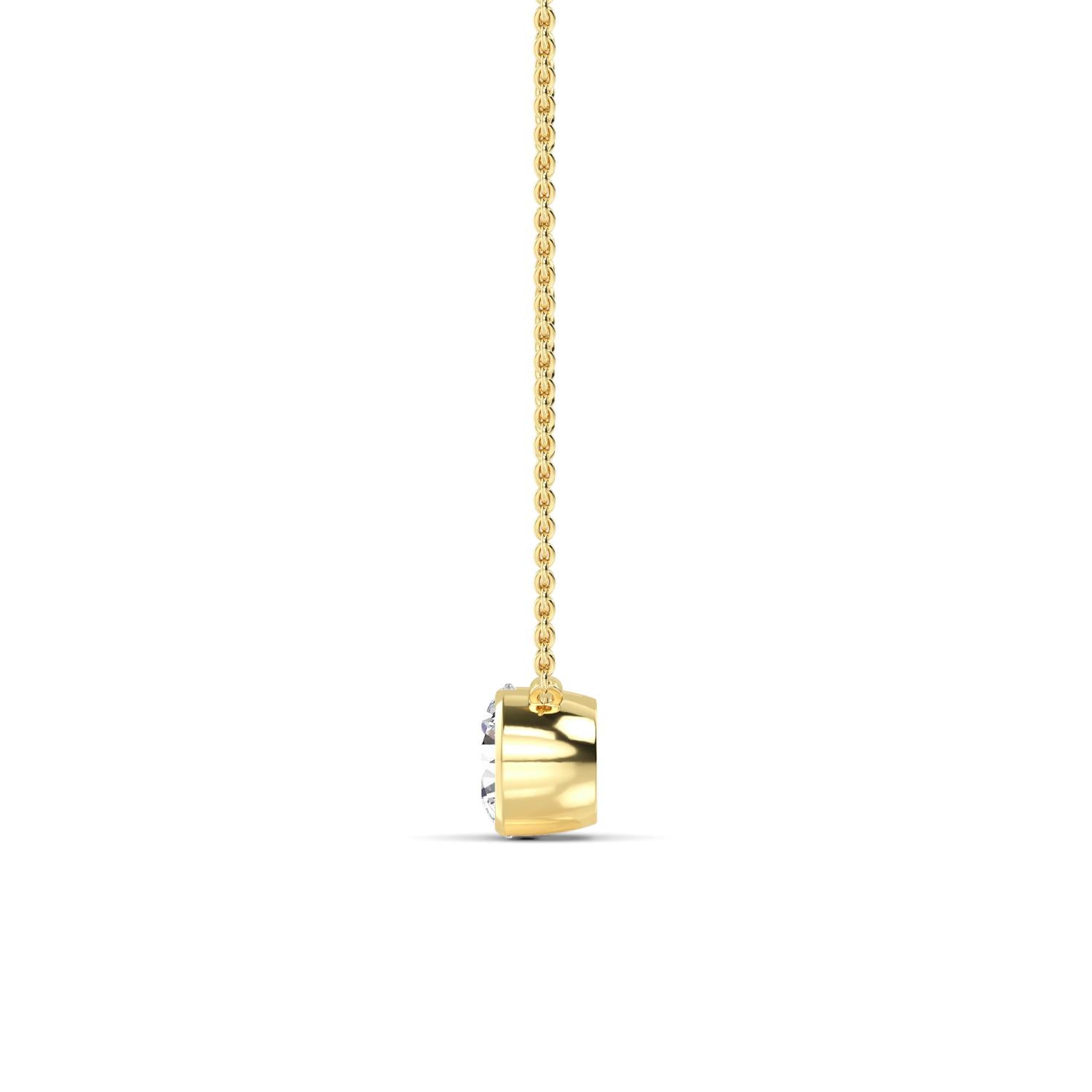 A yellow gold pendant necklace featuring a small, polished rectangular box-shaped pendant with a clear gemstone, suspended from a delicate gold chain against a plain white background.