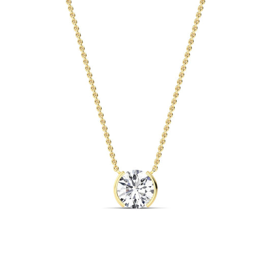 Gold necklace with a diamond pendant on a white background