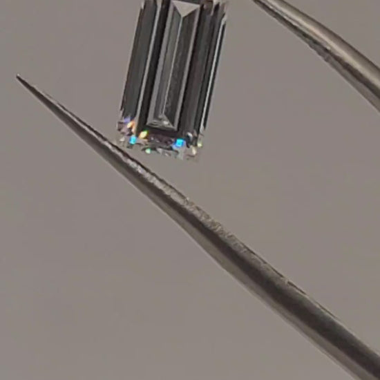 Video of baguette lab diamond held in tweezers