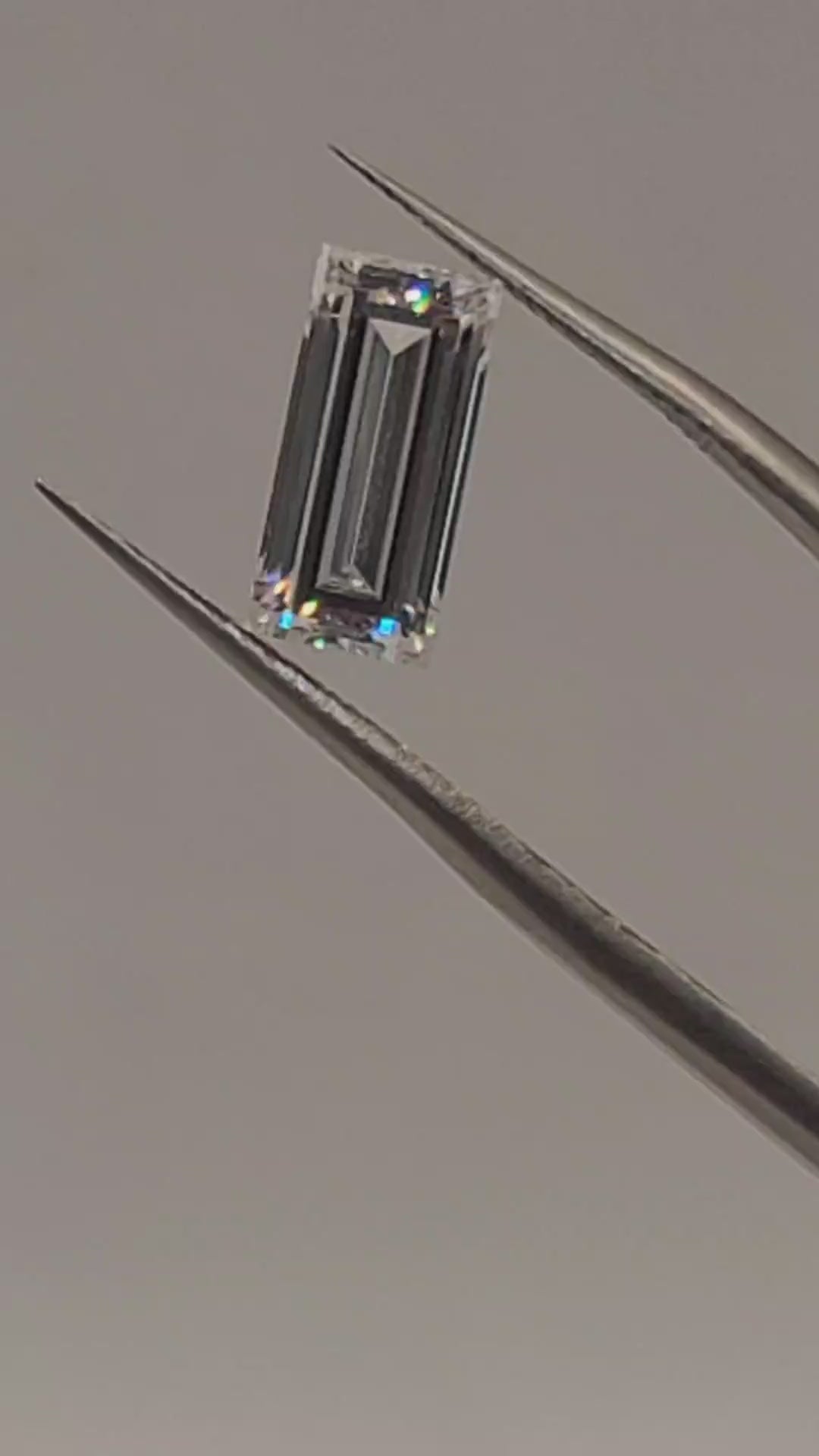 Video of baguette lab diamond held in tweezers