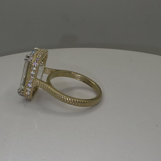 Emerald Diamond and yellow gold ring with millgrain detail in white ring box
