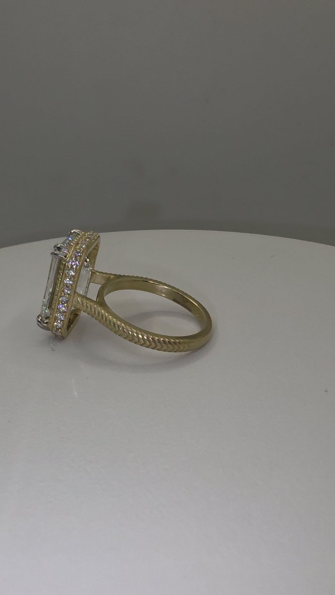 Emerald Diamond and yellow gold ring with millgrain detail in white ring box