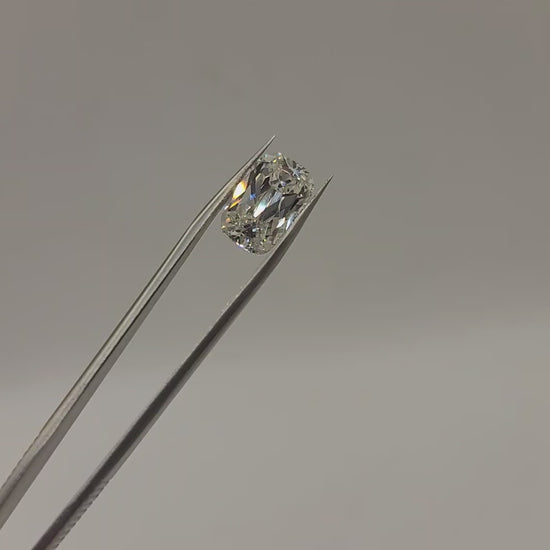Video of lab diamond held in tweezers. 
